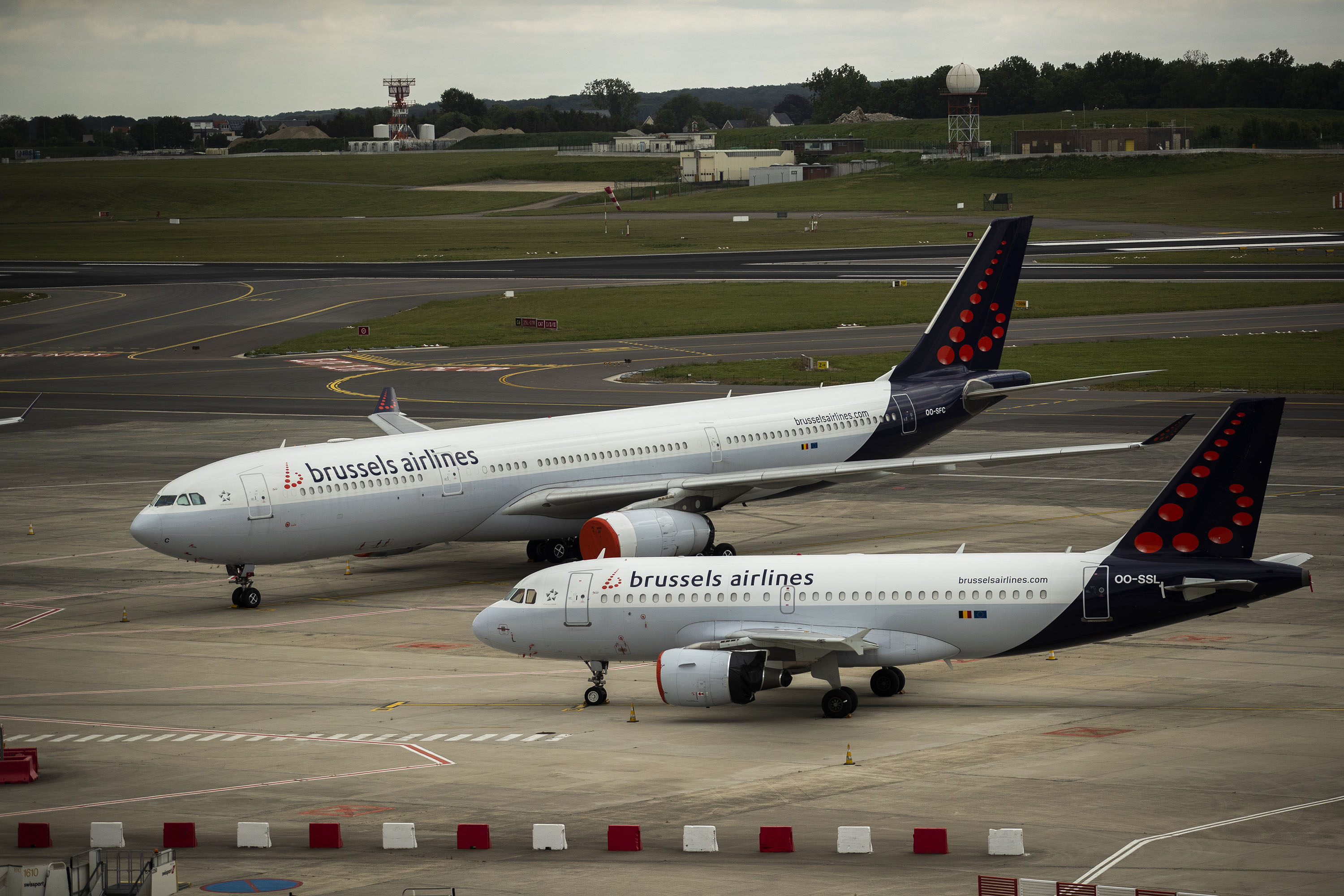 Planes from Brussels Airlines sit idle on the tarmac at Brussels Airport in Belgium, on Tuesday, May 12. 