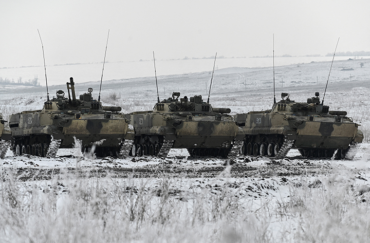 Russian BMP-3 infantry fighting vehicles participate in drills held by the armed forces of the Southern Military District at the Kadamovsky range in the Rostov region, Russia on Thursday, January 27.