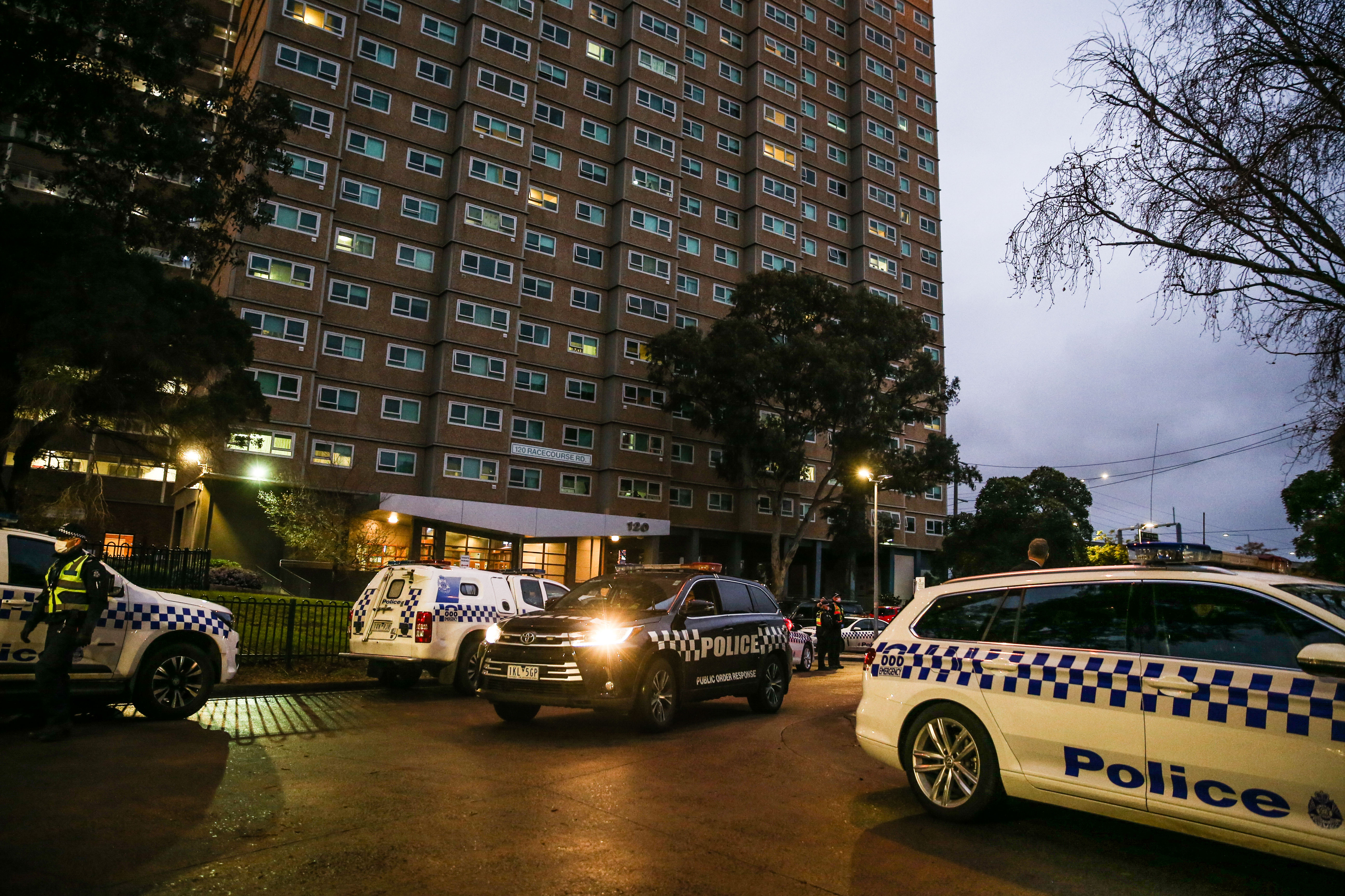 Police surround Flemington public housing flats in Melbourne, Australia, on July 4.