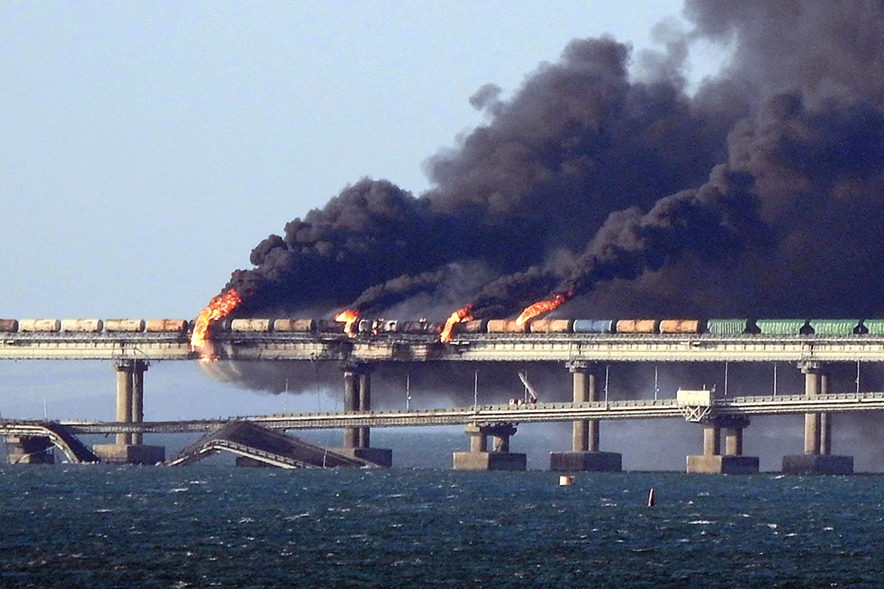 Black smoke billows from a fire at the Kerch bridge on October 8. 
