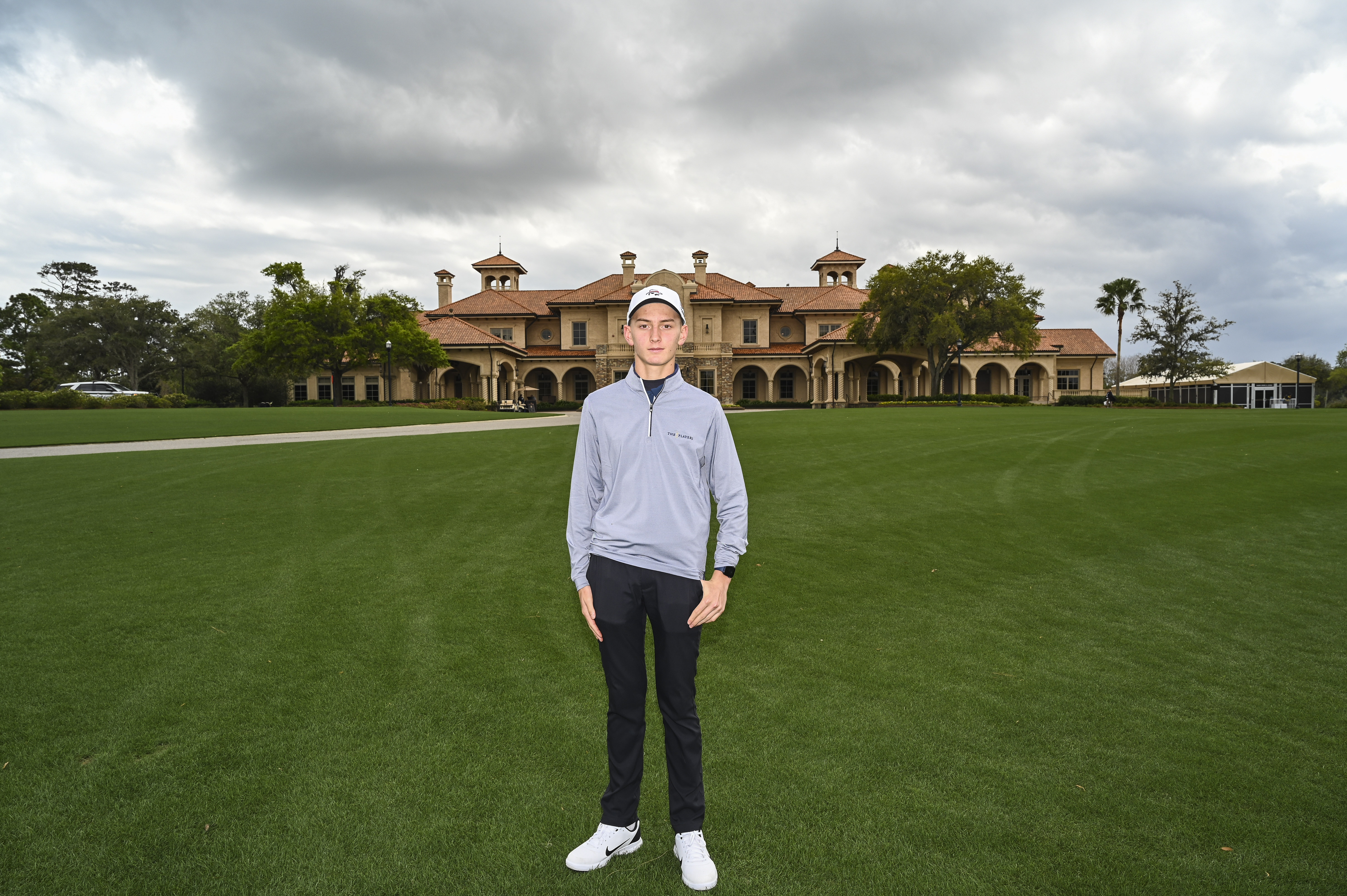 Mykhailo "Misha" Golod of Ukraine stands in front of the clubhouse on the Stadium Course at TPC Sawgrass on March 14 in Ponte Vedra Beach, Florida. 