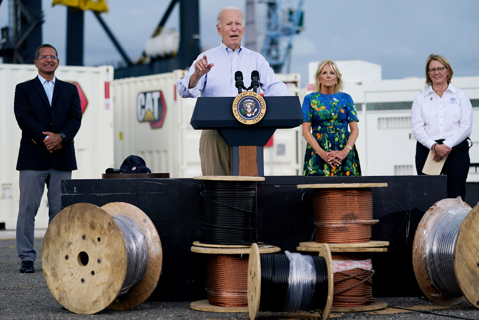 President Joe Biden, with first lady Jill Biden and Puerto Rico Gov. Pedro Pierluisi, left, and FEMA Administrator Deanne Criswell, right, delivers remarks on Hurricane Fiona in Ponce, Puerto Rico on Monday. 