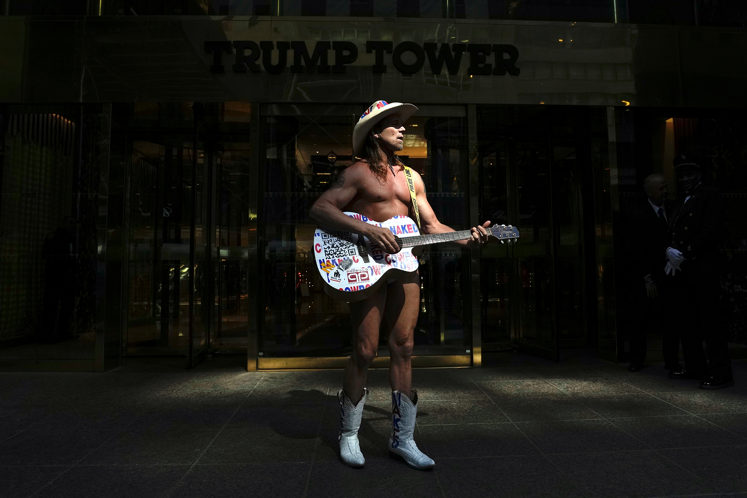 The Naked Cowboy performs outside Trump Tower, Monday, April 3, 2023 in New York.