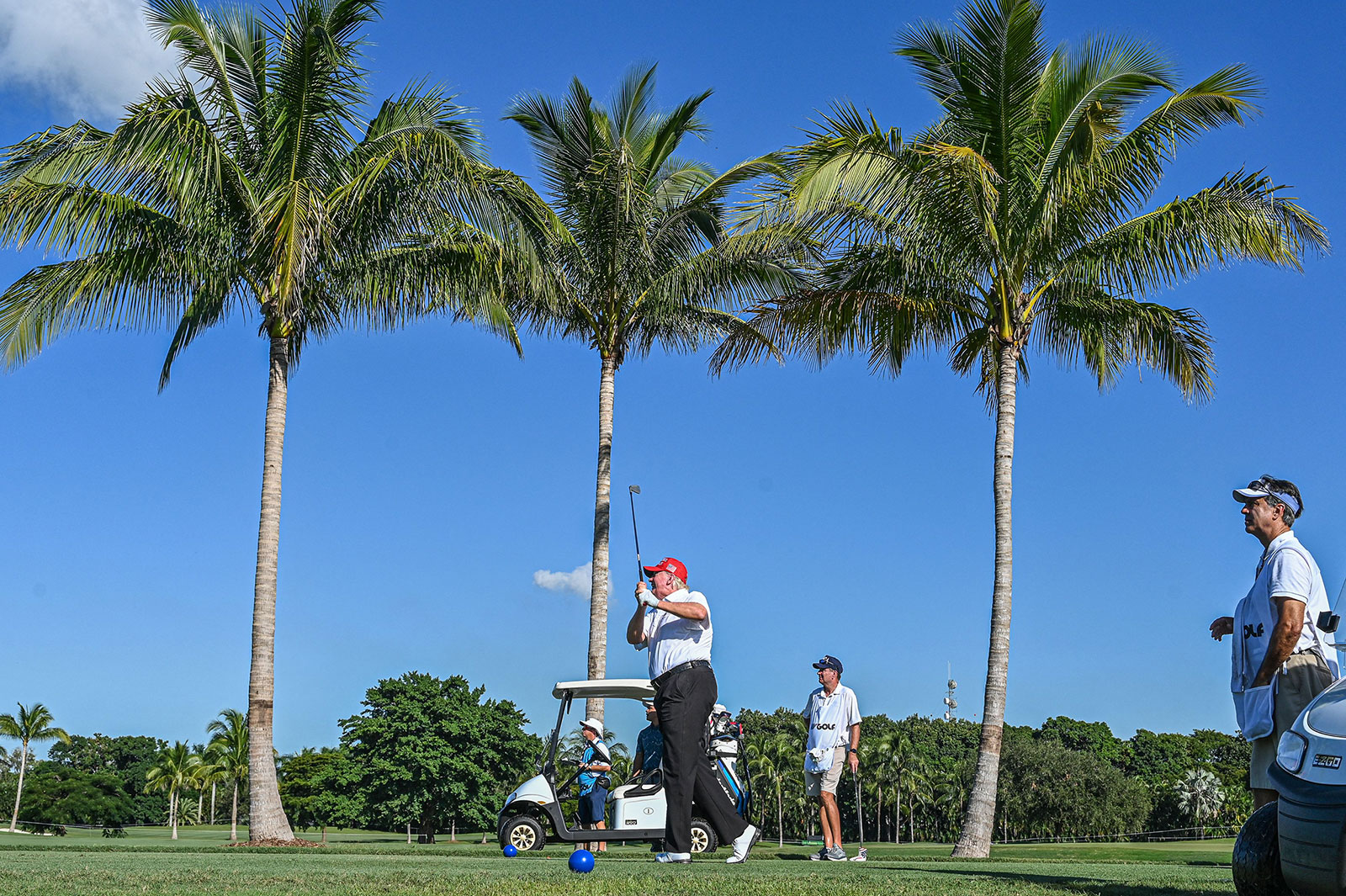 Former President Donald Trump plays golf at Trump National Doral ahead of a LIV Golf event in October 2022.