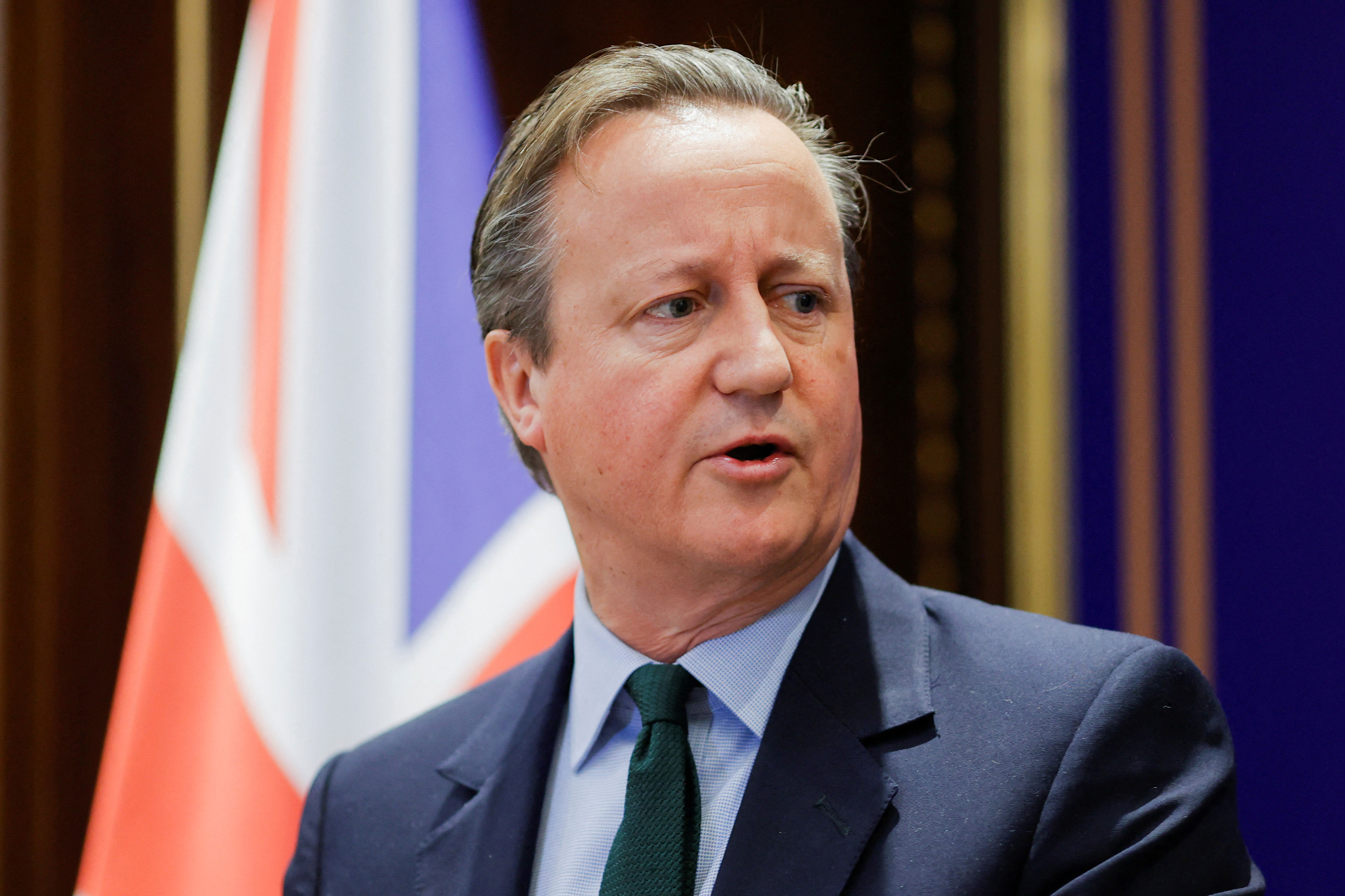 British Foreign Secretary David Cameron speaks at a press conference in Pristina, Kosovo, on January 4. 