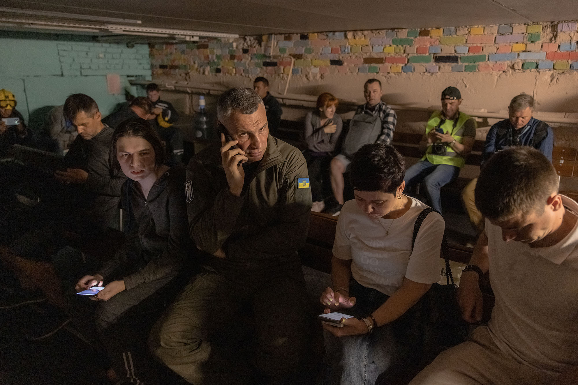 Mayor of Kyiv Vitali Klitschko, center, sits with others in a school's shelter during an air raid alert on June 1, in Kyiv, Ukraine.