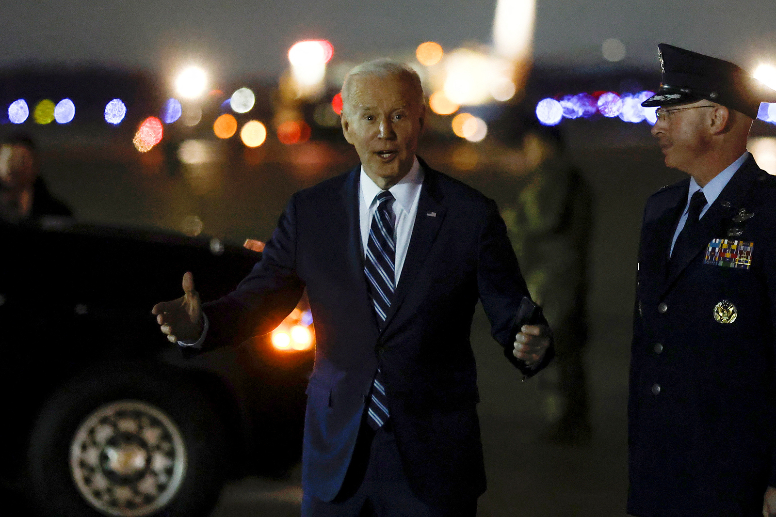 President Biden tells reporters “We’re going to win tonight in Georgia” as he arrives at Joint Base Andrews in Maryland on Tuesday.