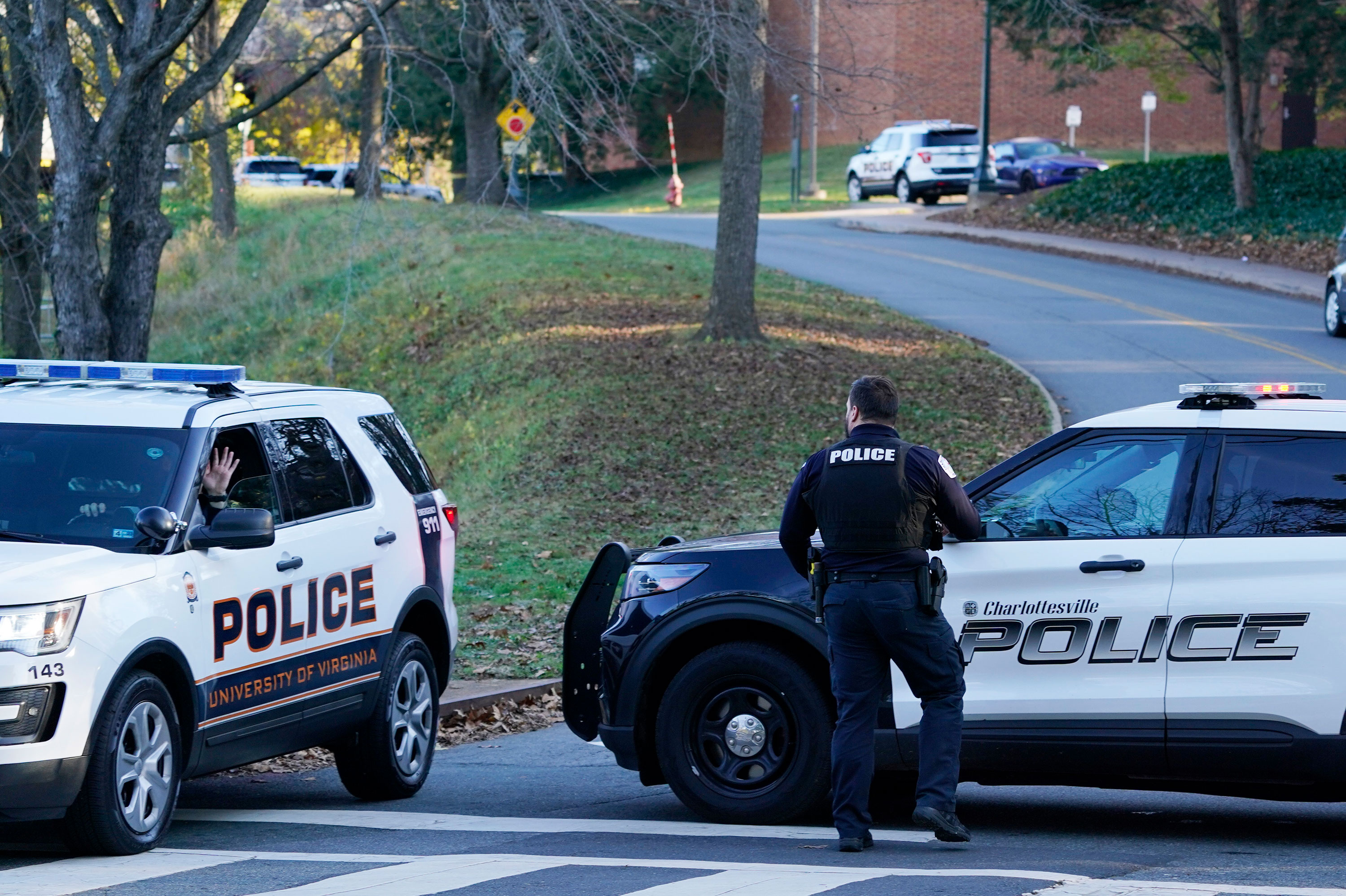 Police secure the scene of the shooting at the University of Virginia in Charlottesville, Virginia, on Monday.