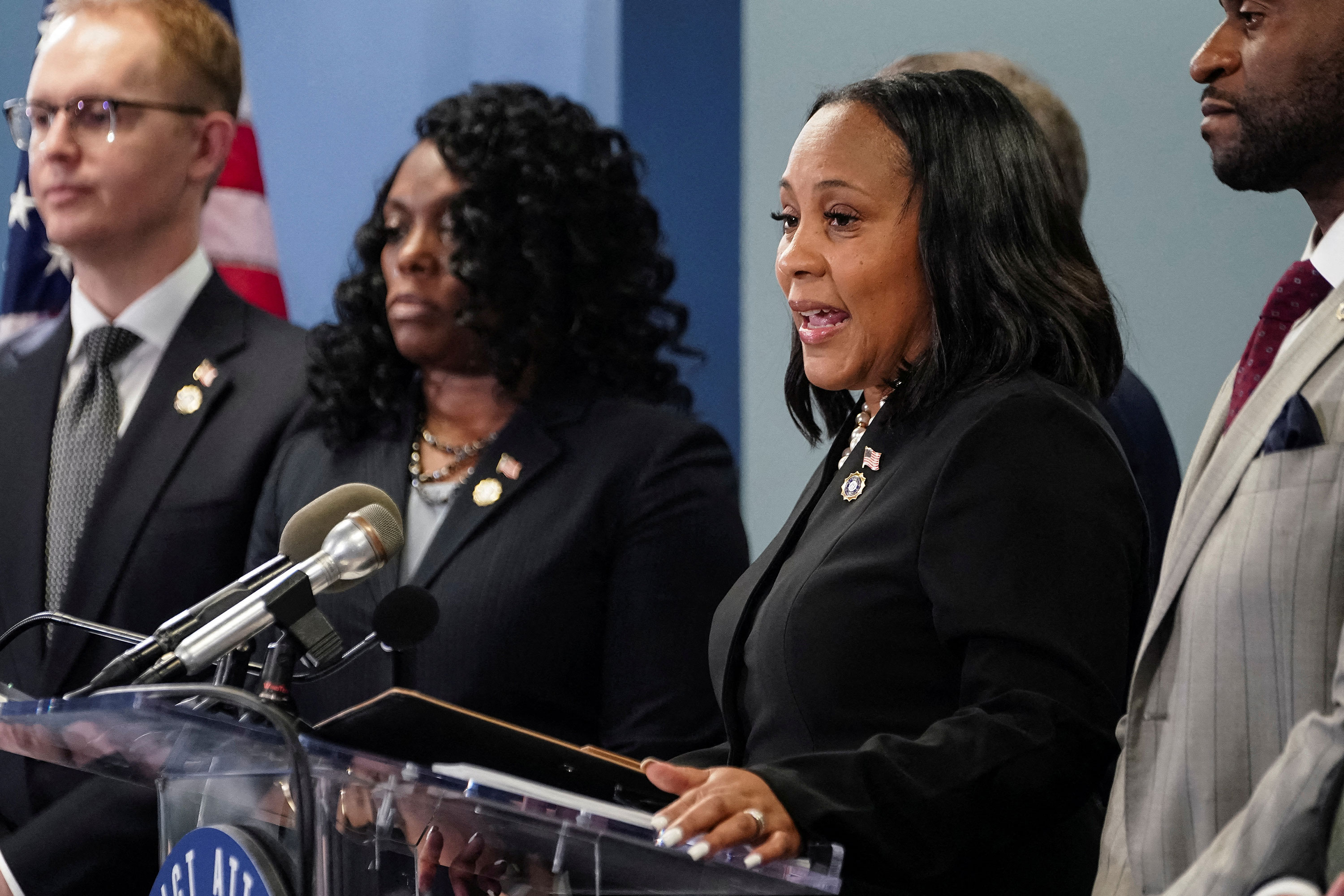 Fulton County District Attorney Fani Willis speaks to the media in Atlanta on August 14 after a grand jury brought back indictments against former President Donald Trump.