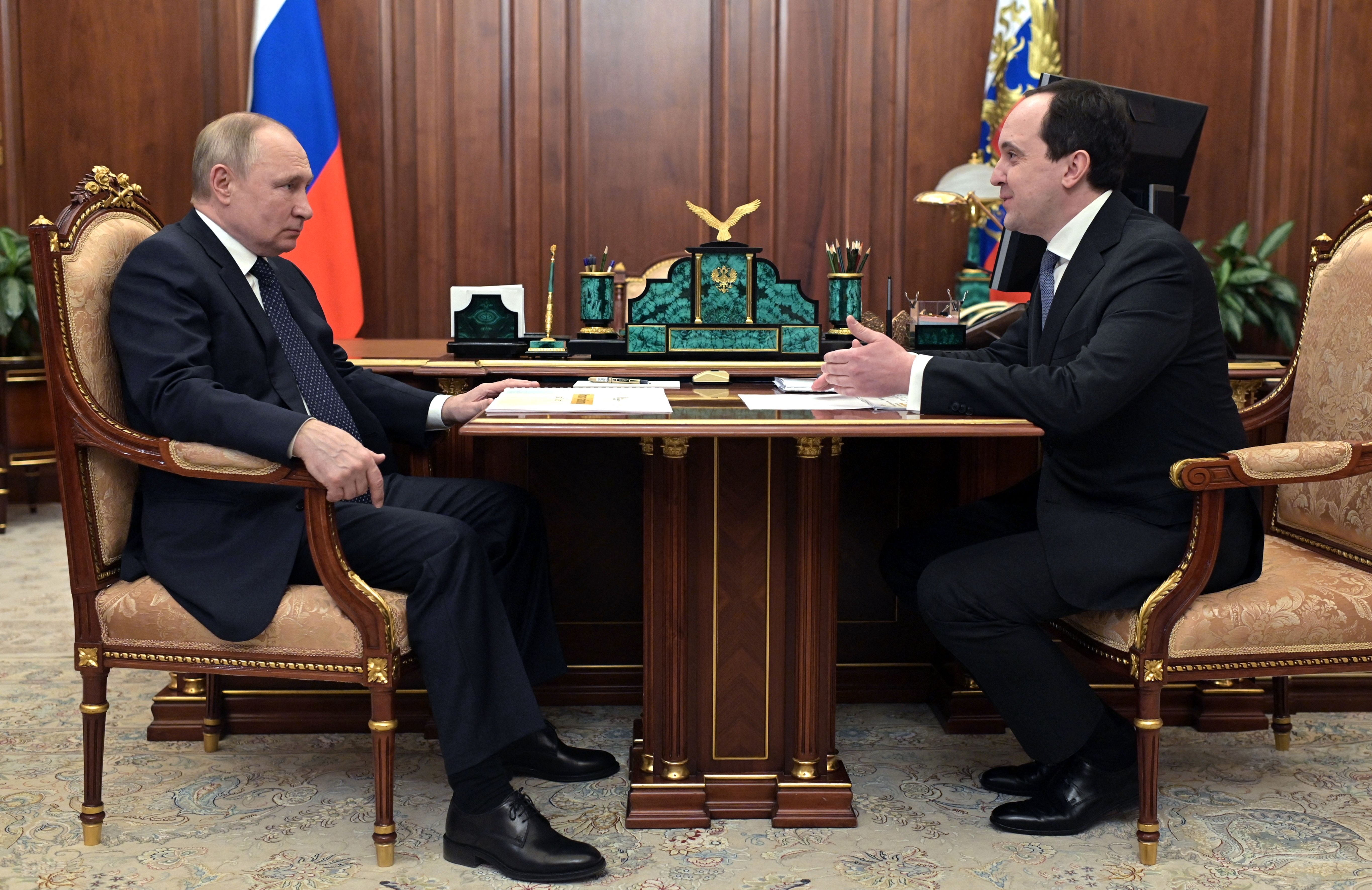 Russian President Vladimir Putin meets with Presidential Grants Foundation CEO Ilya Chukalin at the Kremlin in Moscow, Russia, on March 29.