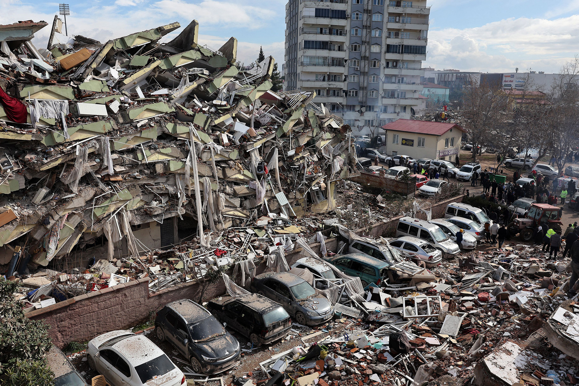 Debris from a collapsed building surrounds an area in Kahramanmaras, Turkey.