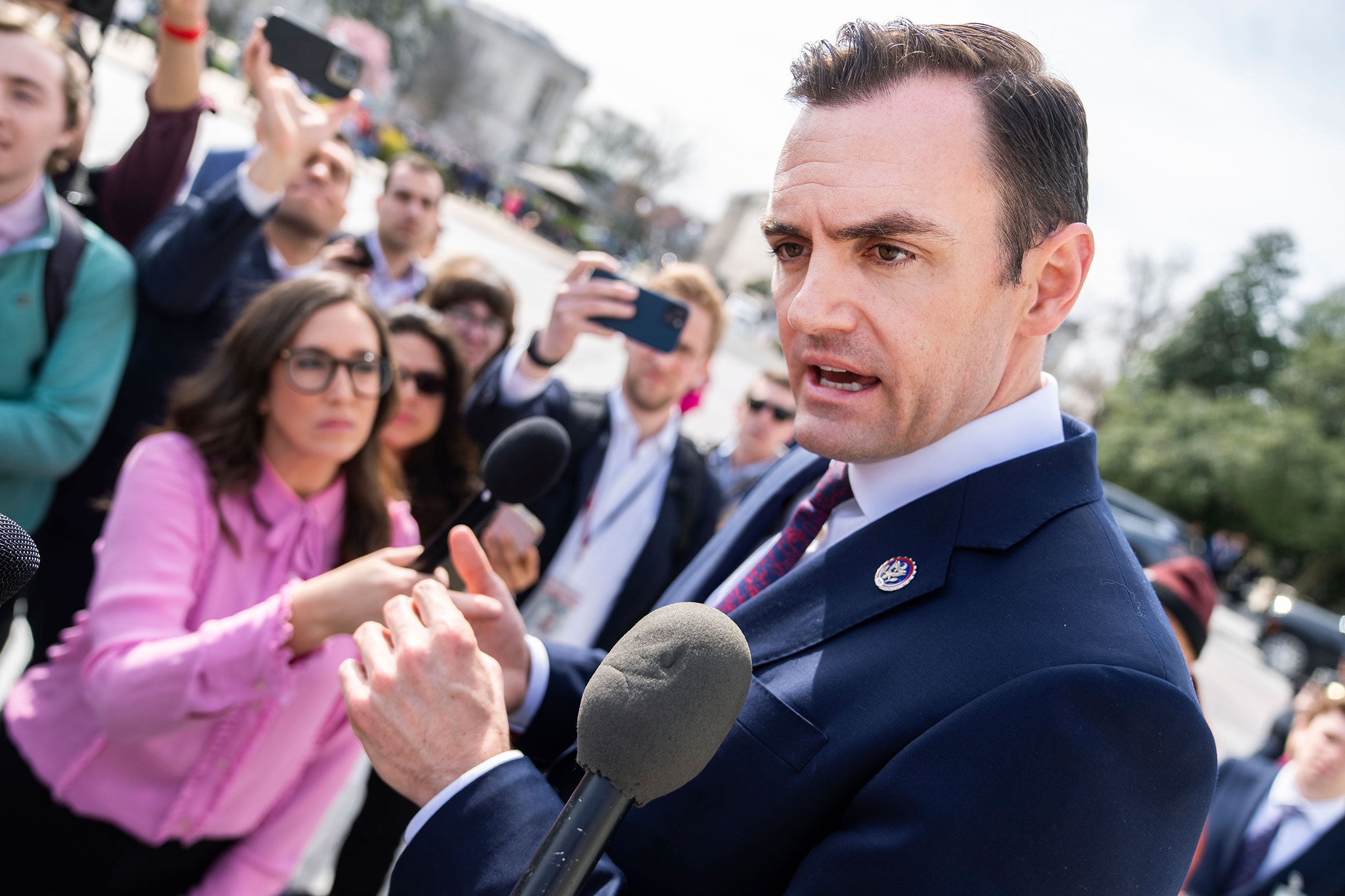 Rep. Mike Gallagher talks with reporters after the House passed a bill that could ban TikTok in the US on Wednesday, March 13. 