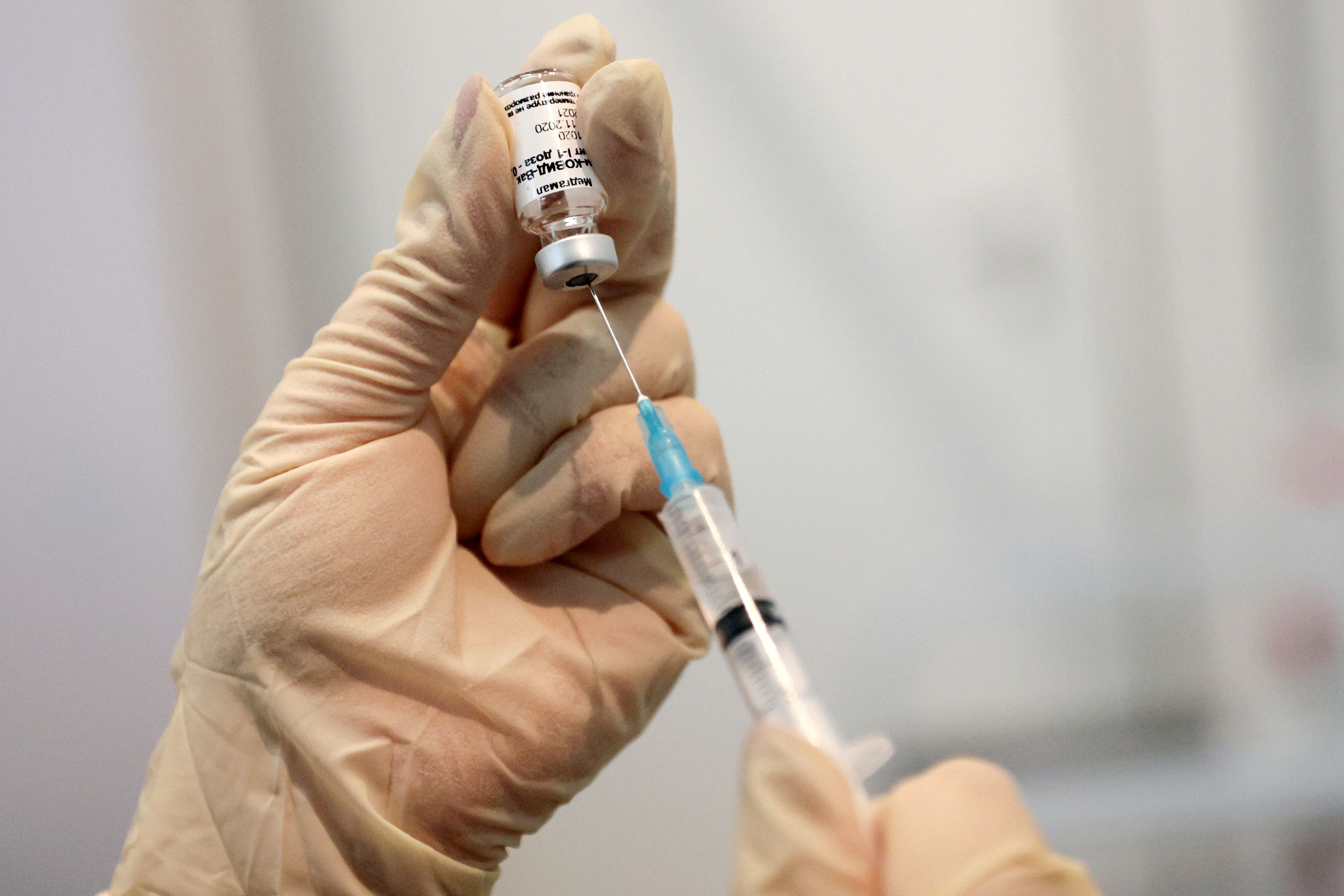 A medical worker in Khimki, Russia, prepares the Gam-COVID-Vac coronavirus vaccine, also called Sputnik V, on January 21.