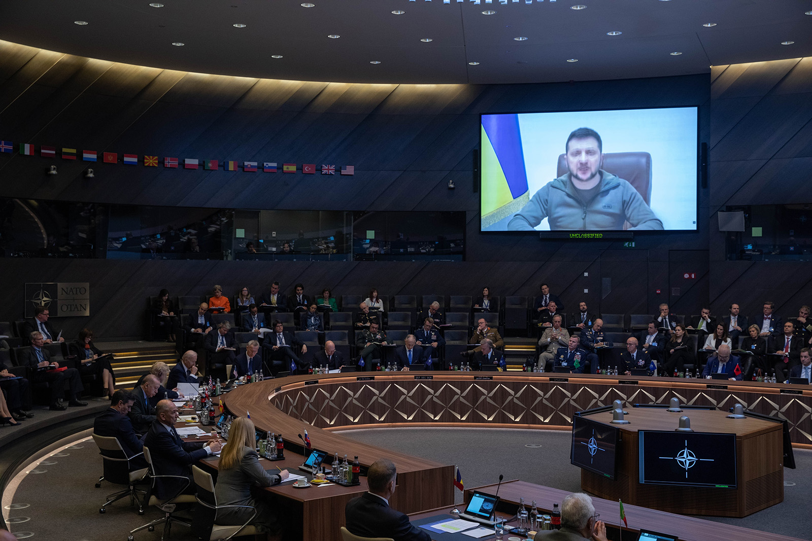 Ukrainian President Volodymyr Zelensky addresses via video link a meeting of the Extraordinary Summit of NATO Heads of State and Government held in Brussels, Belgium, on March 24.