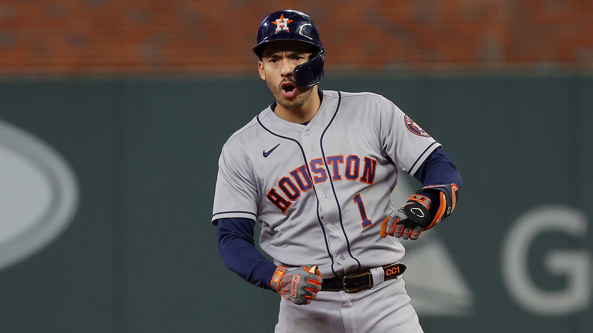 Carlos Correa of the Astros celebrates after hitting an RBI double during the third inning.