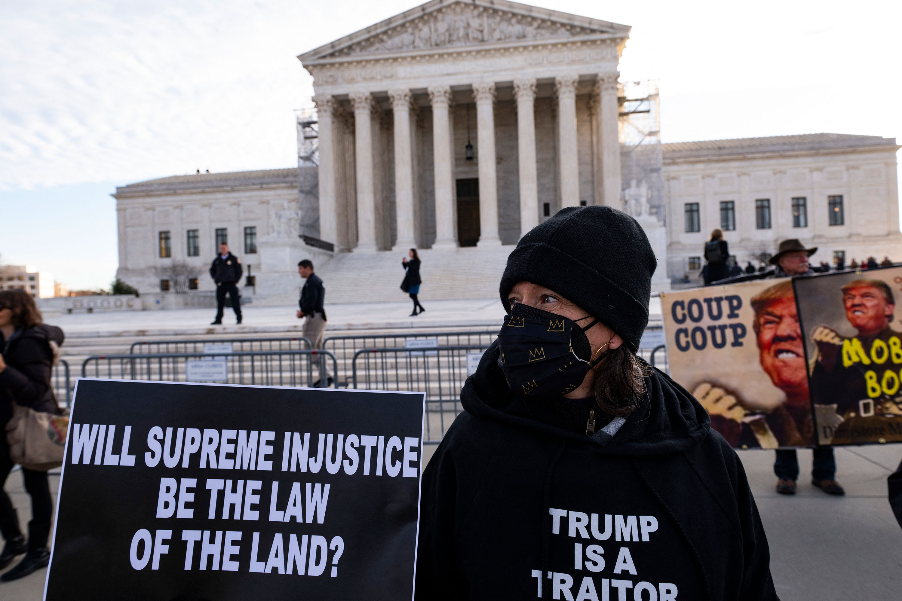 A person protests outside the Supreme Court in Washington, DC, on Thursday morning.