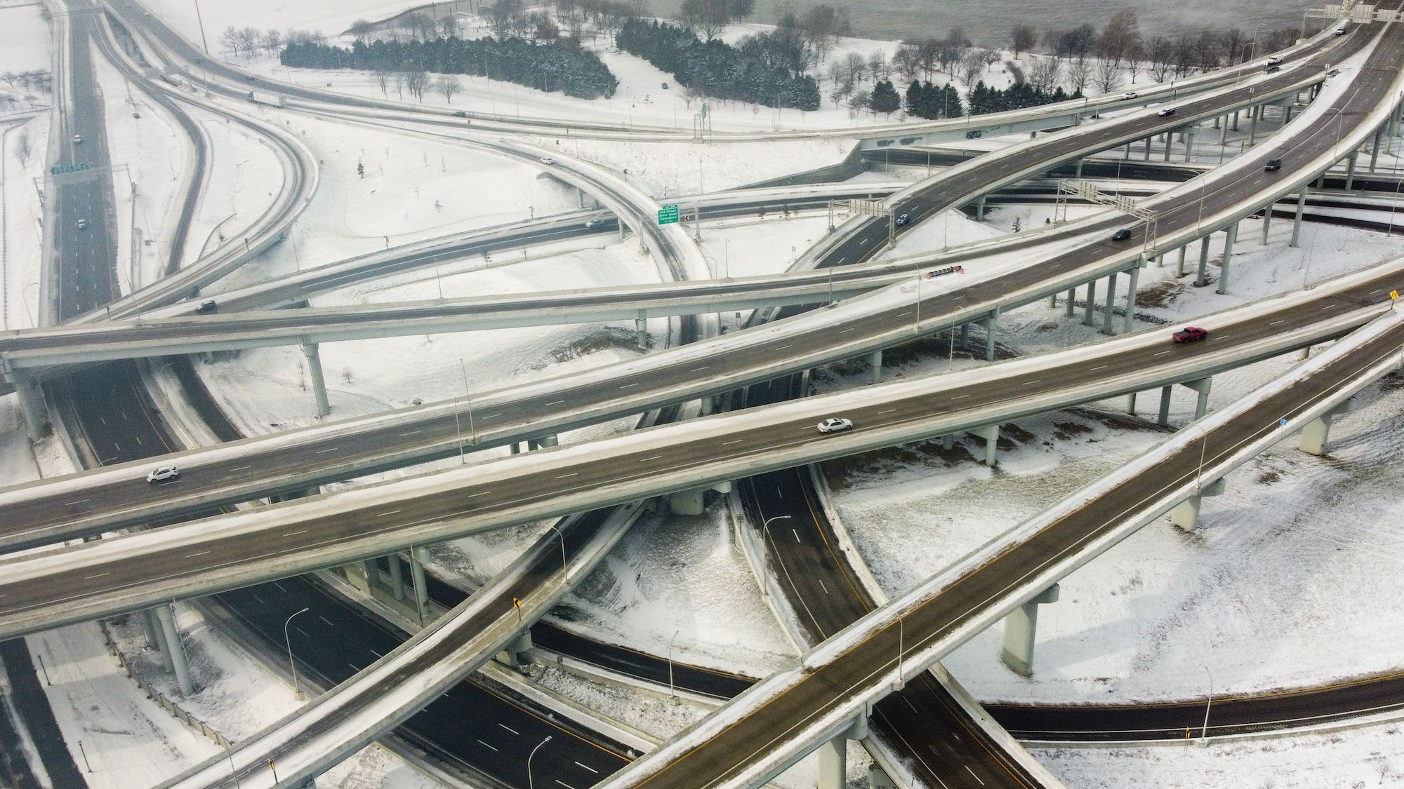 Vehicles move along a highway in Louisville, Kentucky, under freezing temperatures on Friday.