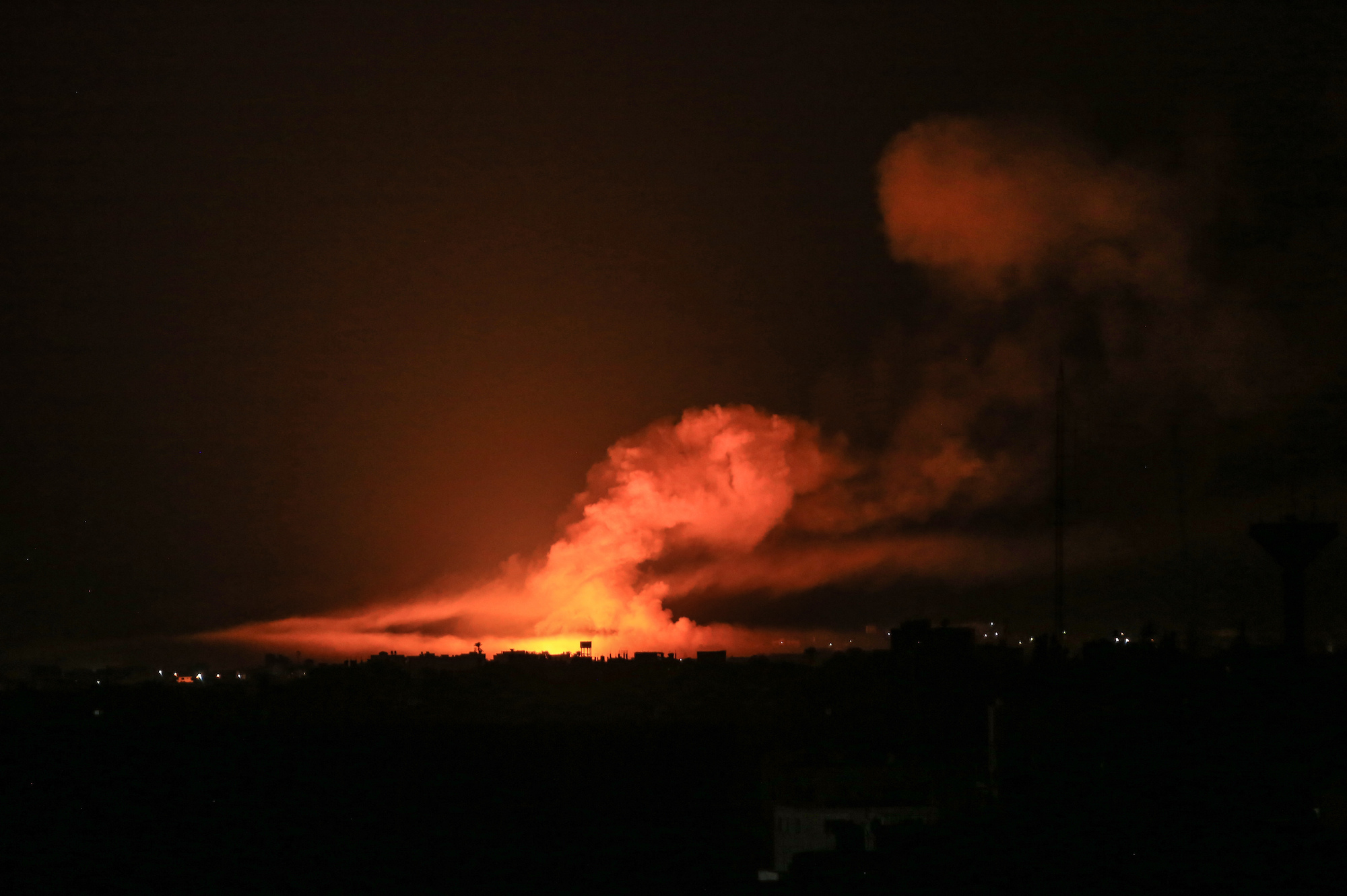 Flames and smoke rise after an Israeli airstrike in Khan Yunis, Gaza, on Wednesday.