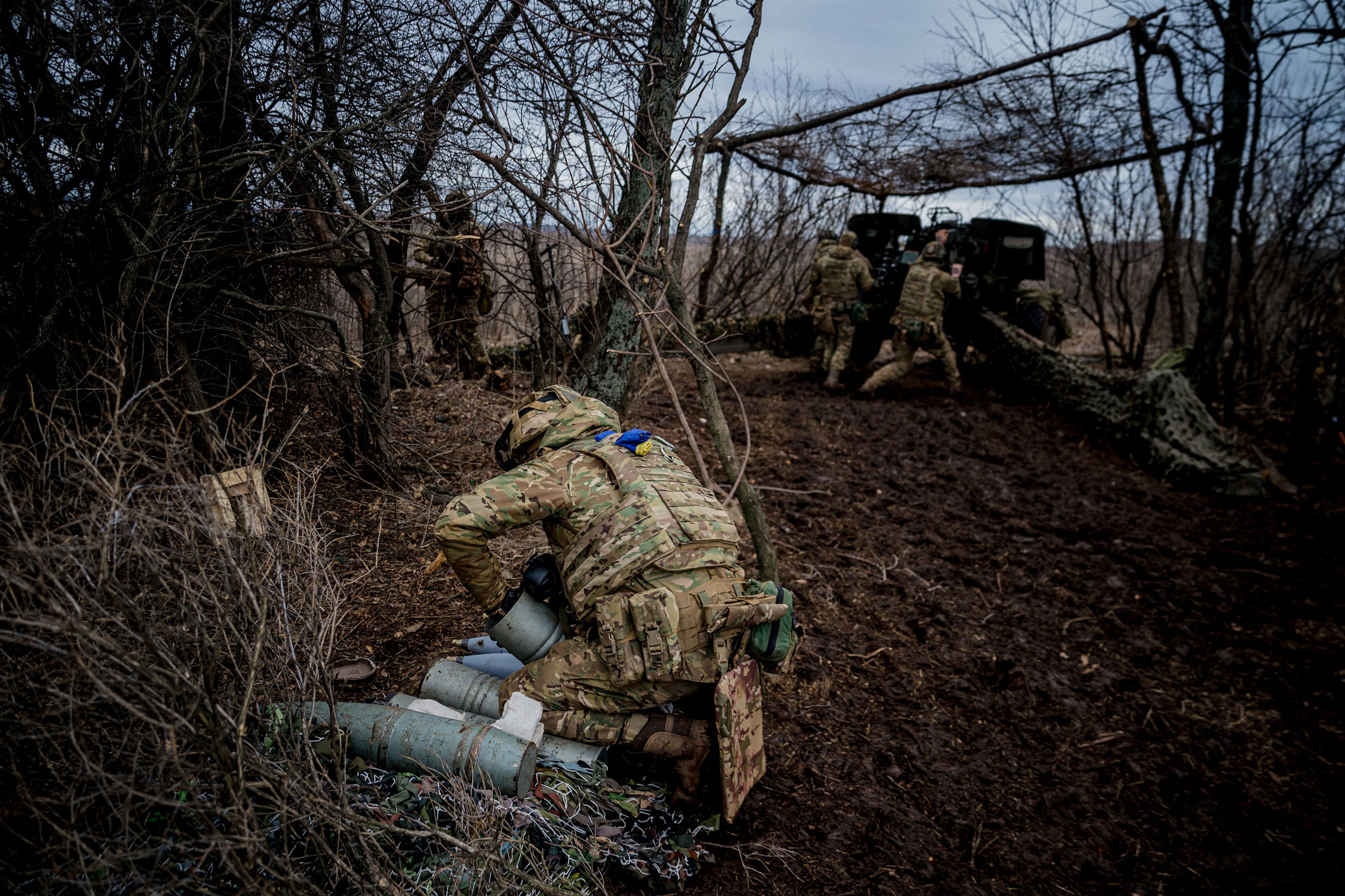 Ukrainian servicemen prepare to fire a Msta-B howitzer towards Russian positions near the frontline town of Bakhmut, Ukraine, on March 2.