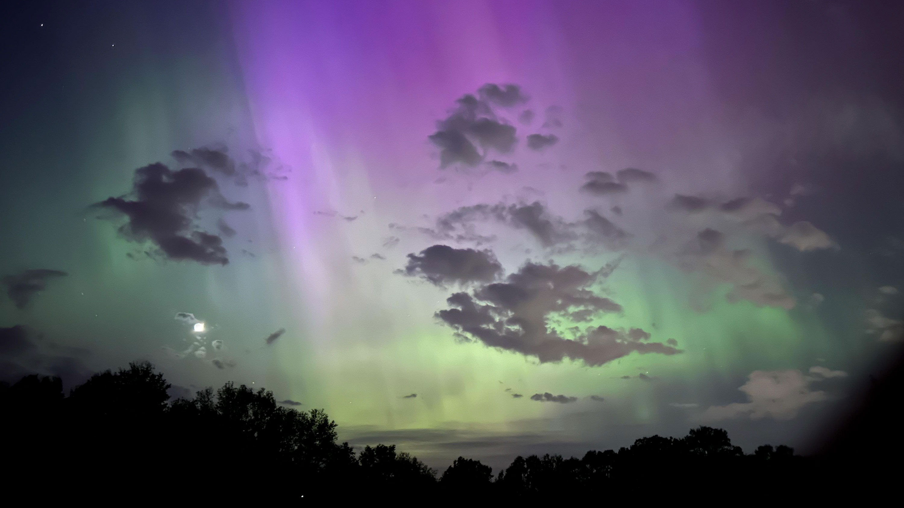 The northern lights can be seen from Eaton Rapids, Michigan, on May 10. 