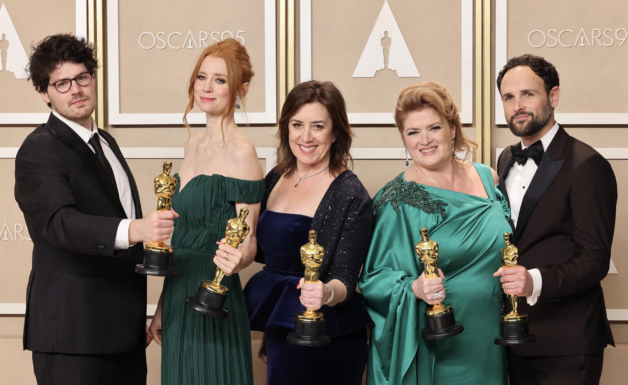 Daniel Roher, Odessa Rae, Diane Becker, Melanie Miller, and Shane Boris, winner of Best Documentary Feature Film award for ’Navalny’ pose in the press room during the 95th Annual Academy Awards at Ovation Hollywood on March 12, in Los Angeles, California. 