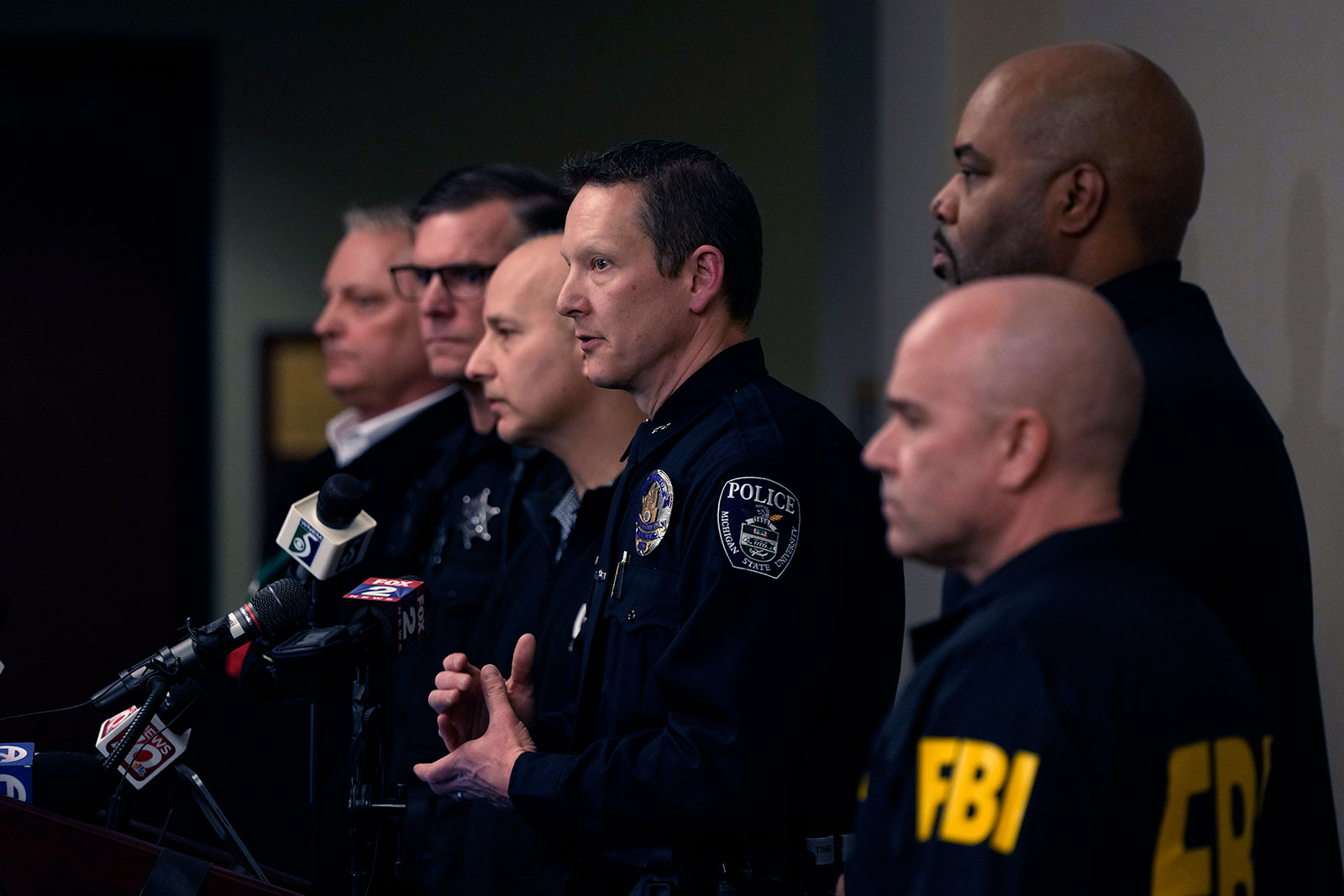 Chris Rozman, MSU Police and Public Safety interim deputy chief, joins law enforcement officials while addressing the media on Tuesday. 