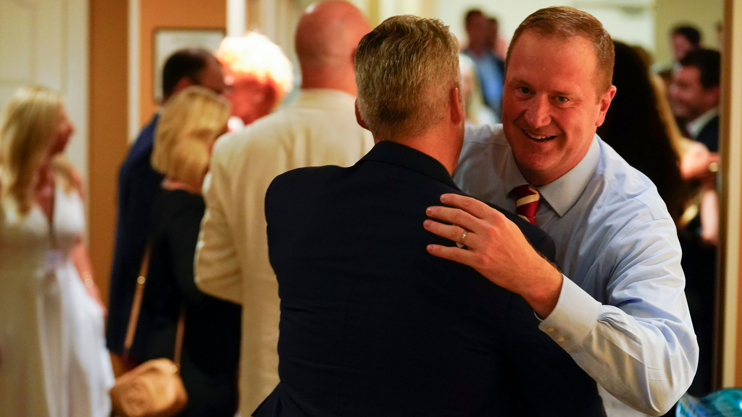 Eric Schmitt meets with supporters at his election night party in St. Louis on Tuesday.