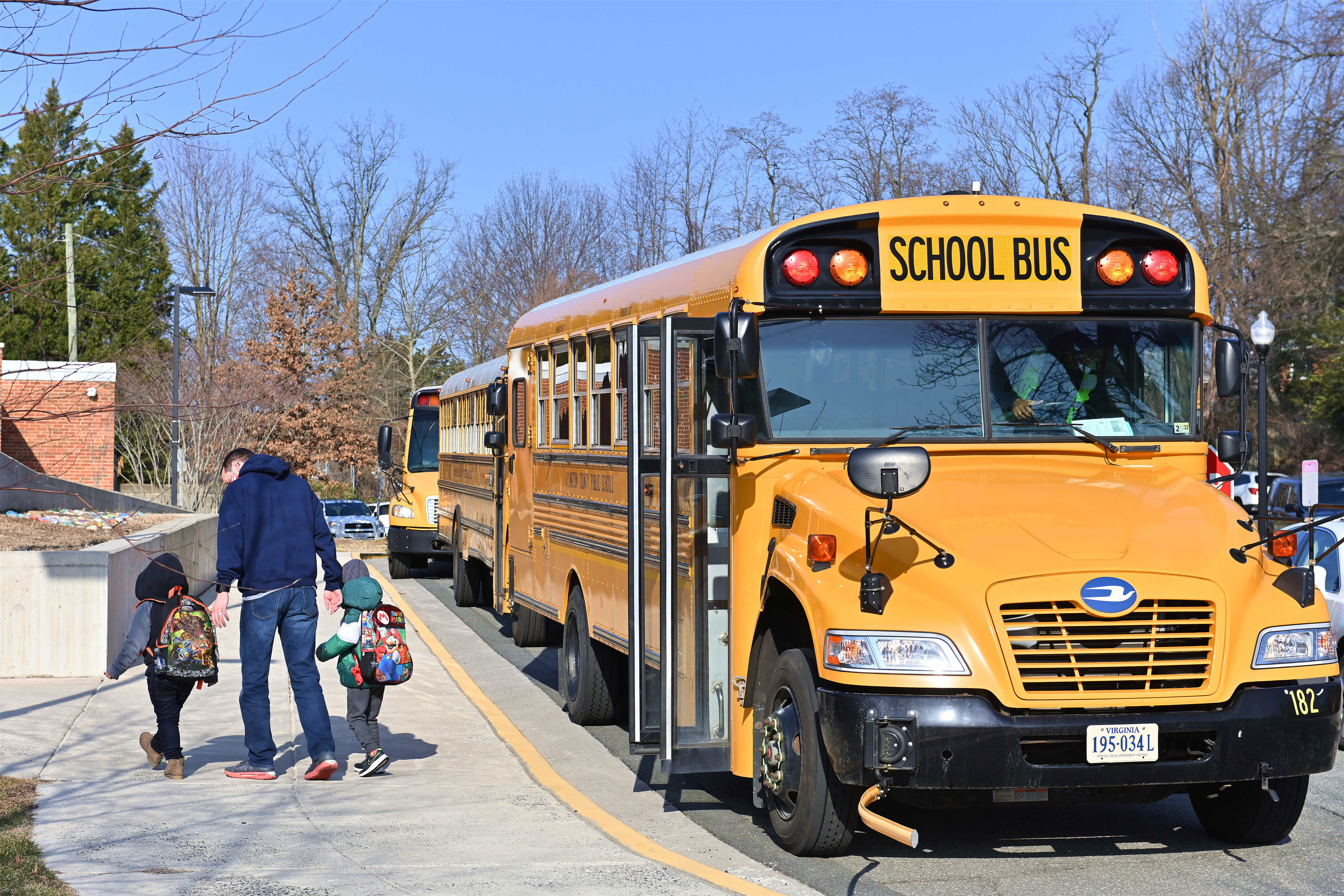 A school bus arrives at an elementary school in Arlington, Virginia, on March 4.