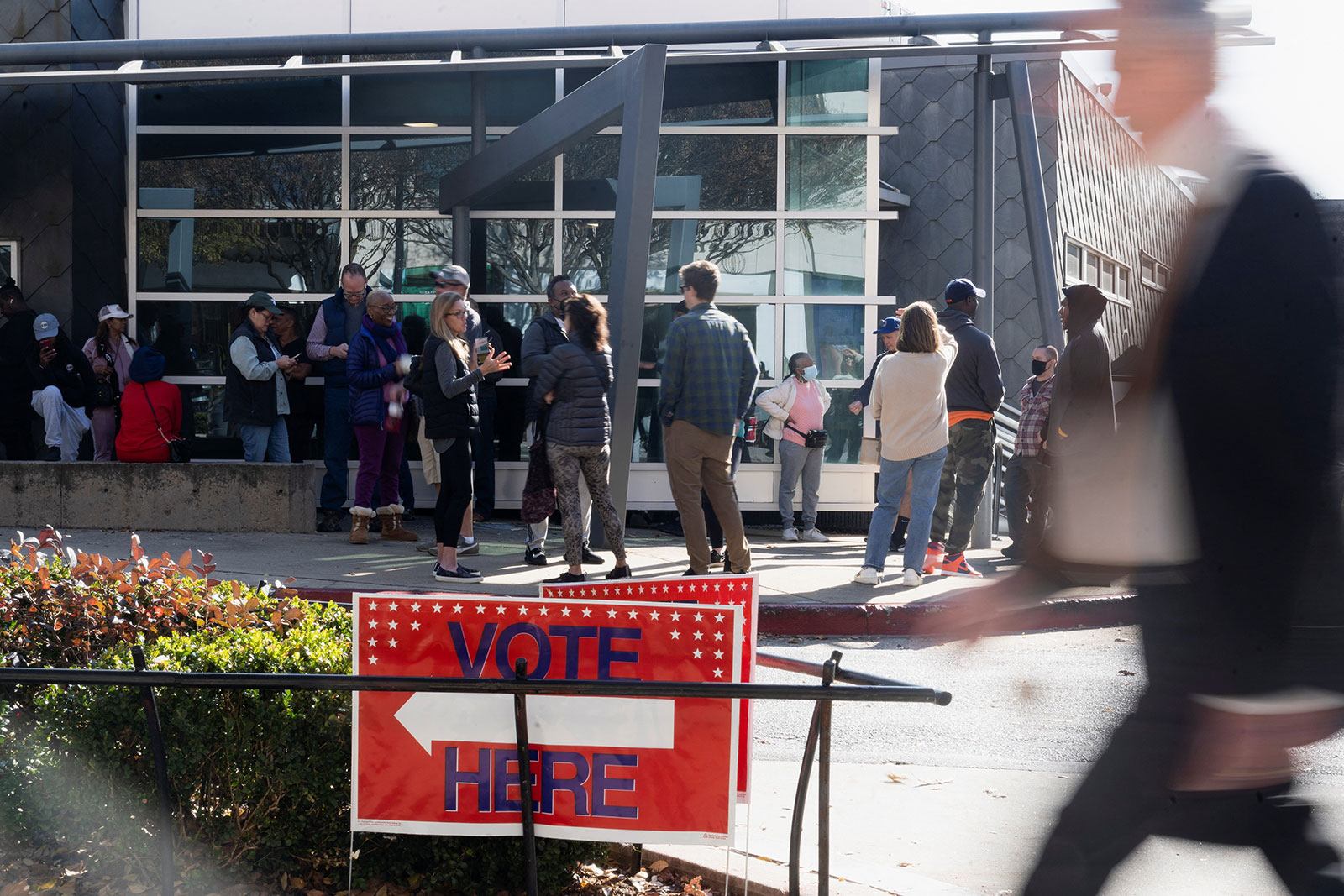 Voters line up at the Metropolitan Library to cast their ballots early in the runoff election in Atlanta on November 29. 