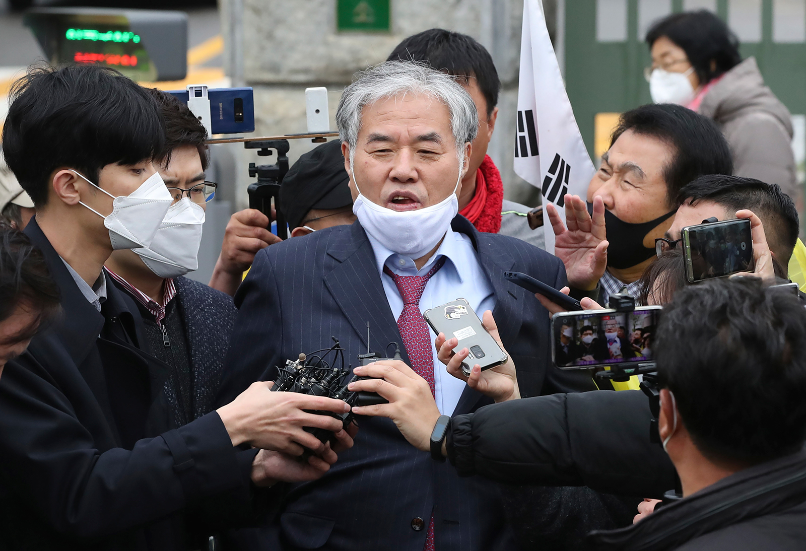 Pastor Jun Kwang-hun of the Sarang Jeil Church speaks outside a detention center in Uiwang, South Korea on April 20.