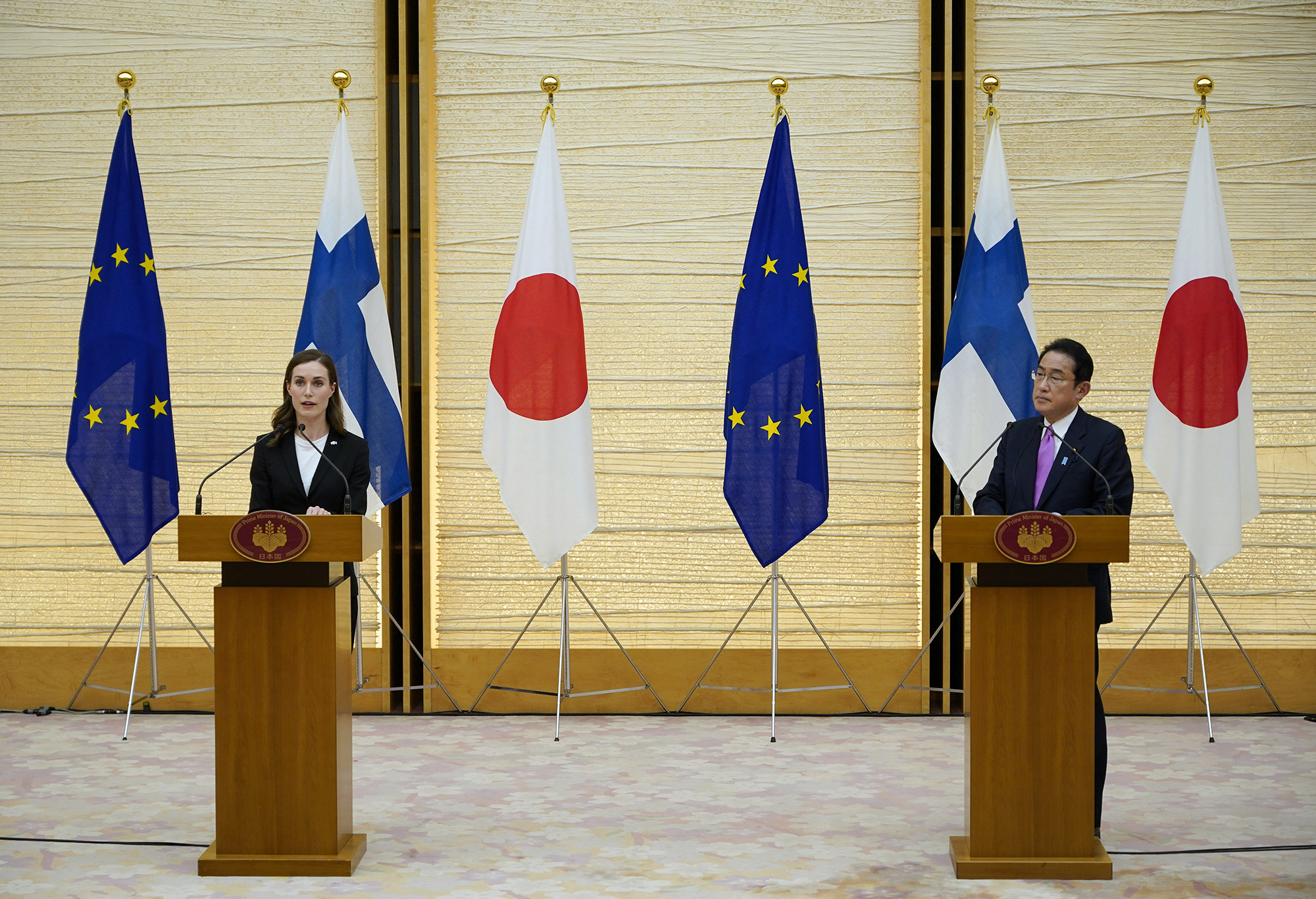 Finland's Prime Minister Sanna Marin, left, speaks next to Japan's Prime Minister Fumio Kishida during a joint press annoucement at the prime minister's official residence in Tokyo, Japan, on May 11.