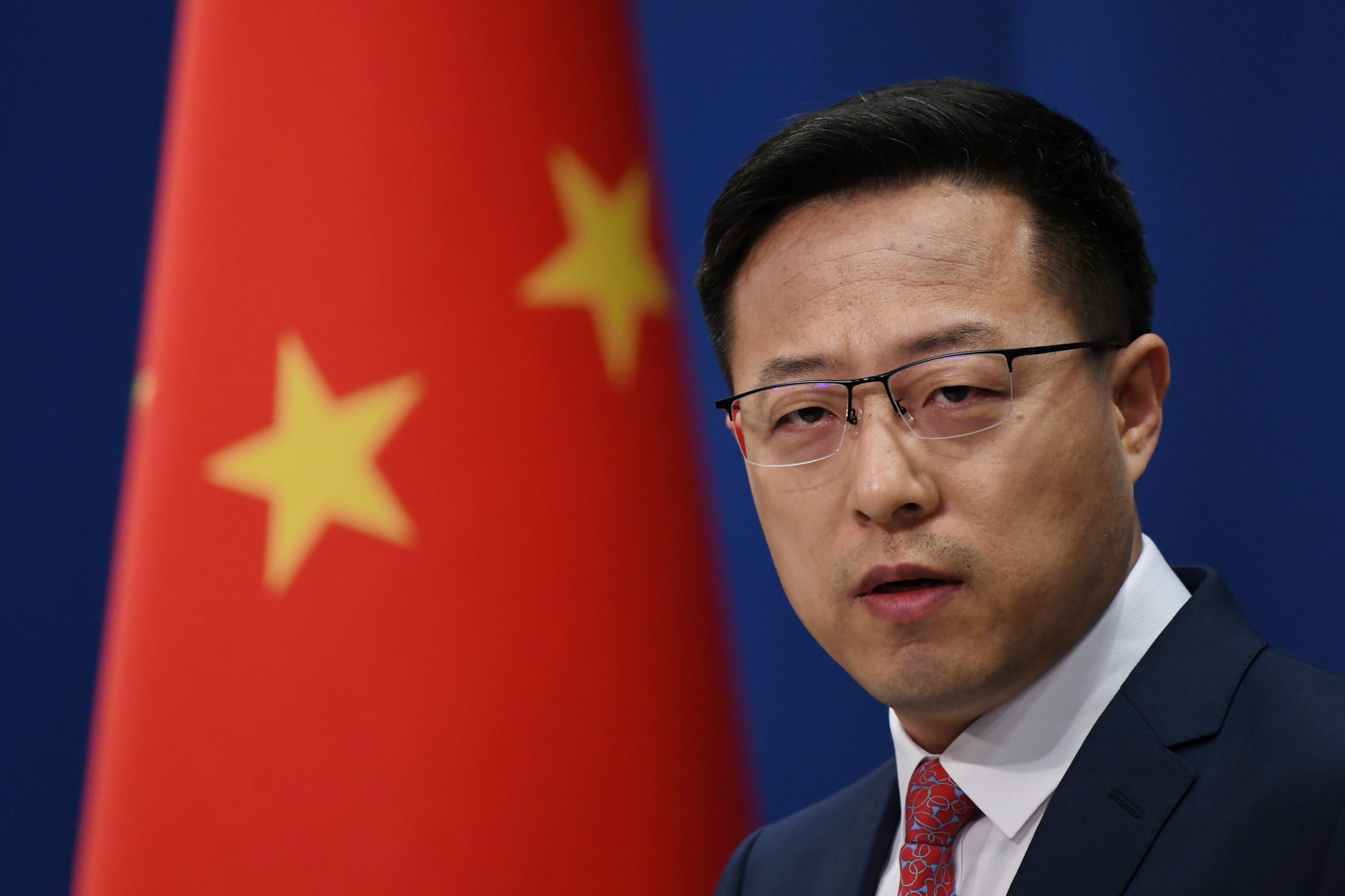 Ministry of Foreign Affairs Spokesperson Zhao Lijian speaks at a briefing in Beijing on April 8.