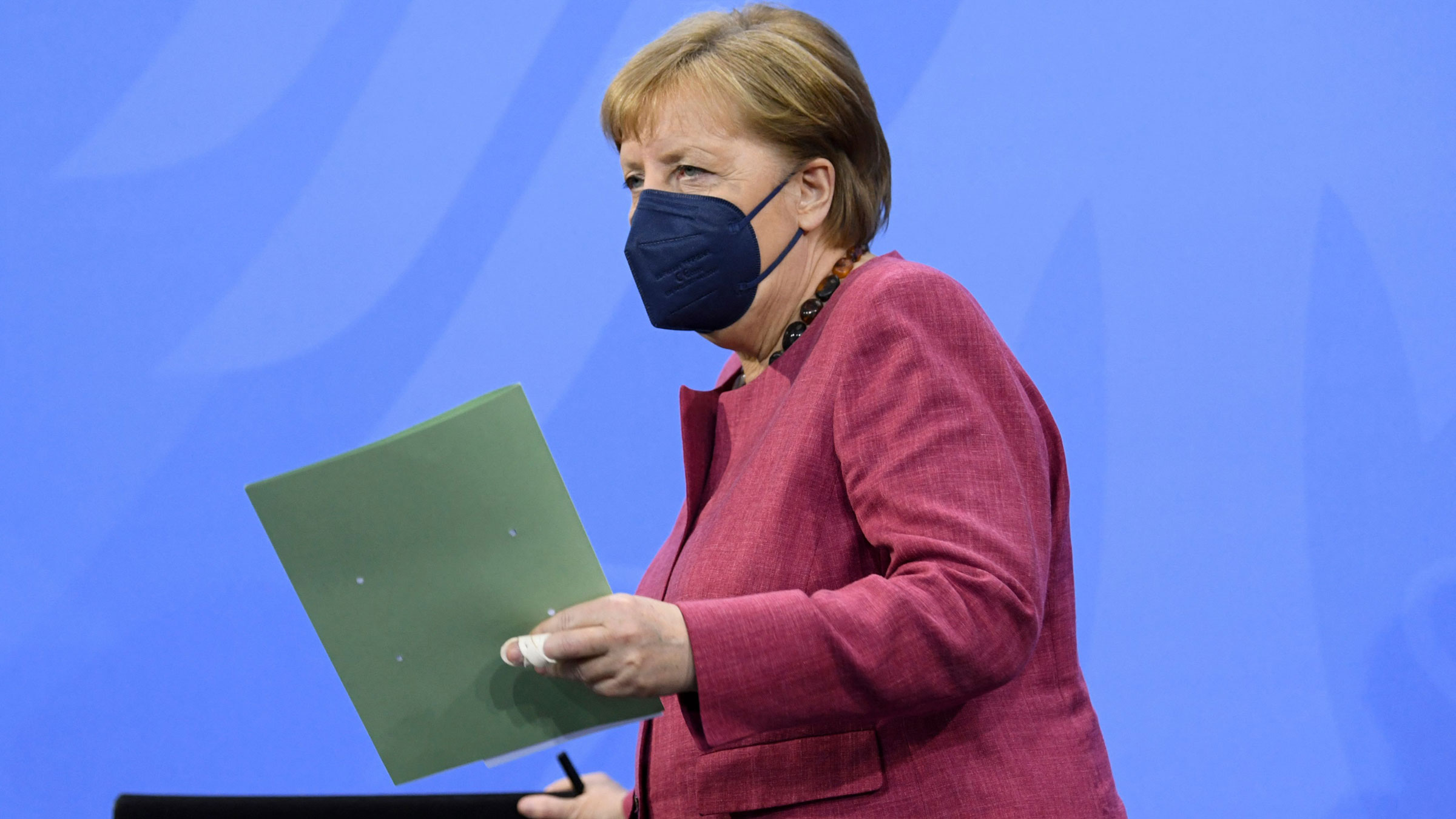 German Chancellor Angela Merkel arrives to Thursday's news conference.