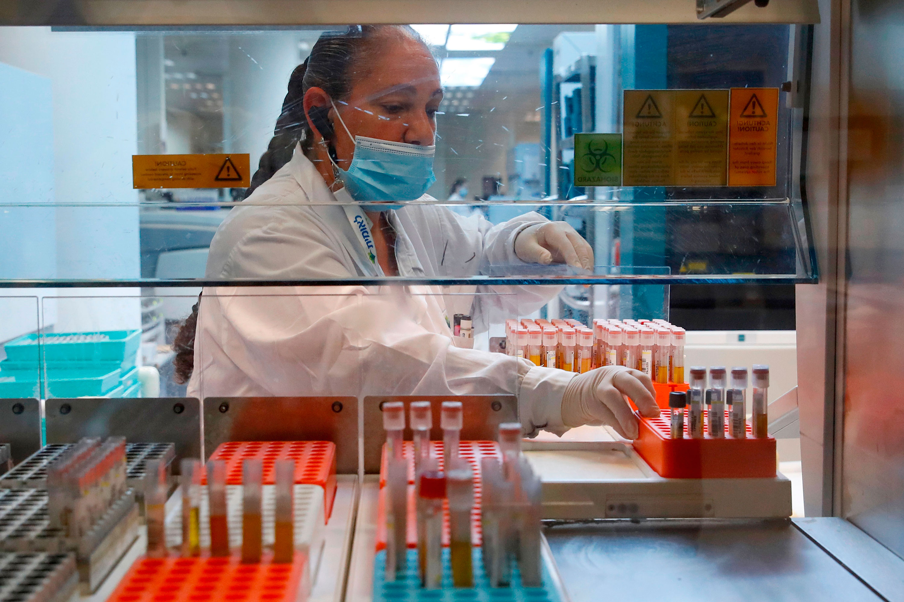 A lab technician sorts blood samples for Covid-19 serological tests at the Leumit Health Services laboratory on July 16 in Or Yehuda, Israel.