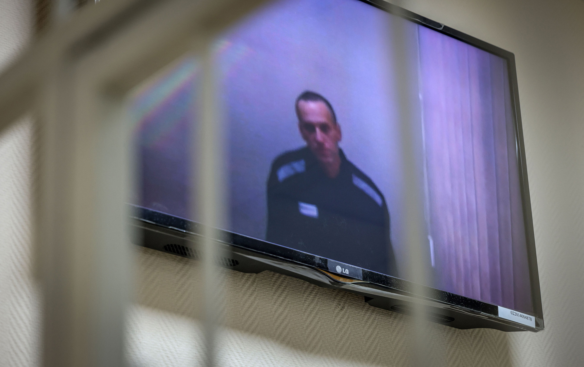 Jailed Kremlin critic Alexei Navalny appears on screen via a video link from prison during a court hearing on May 26, 2021.