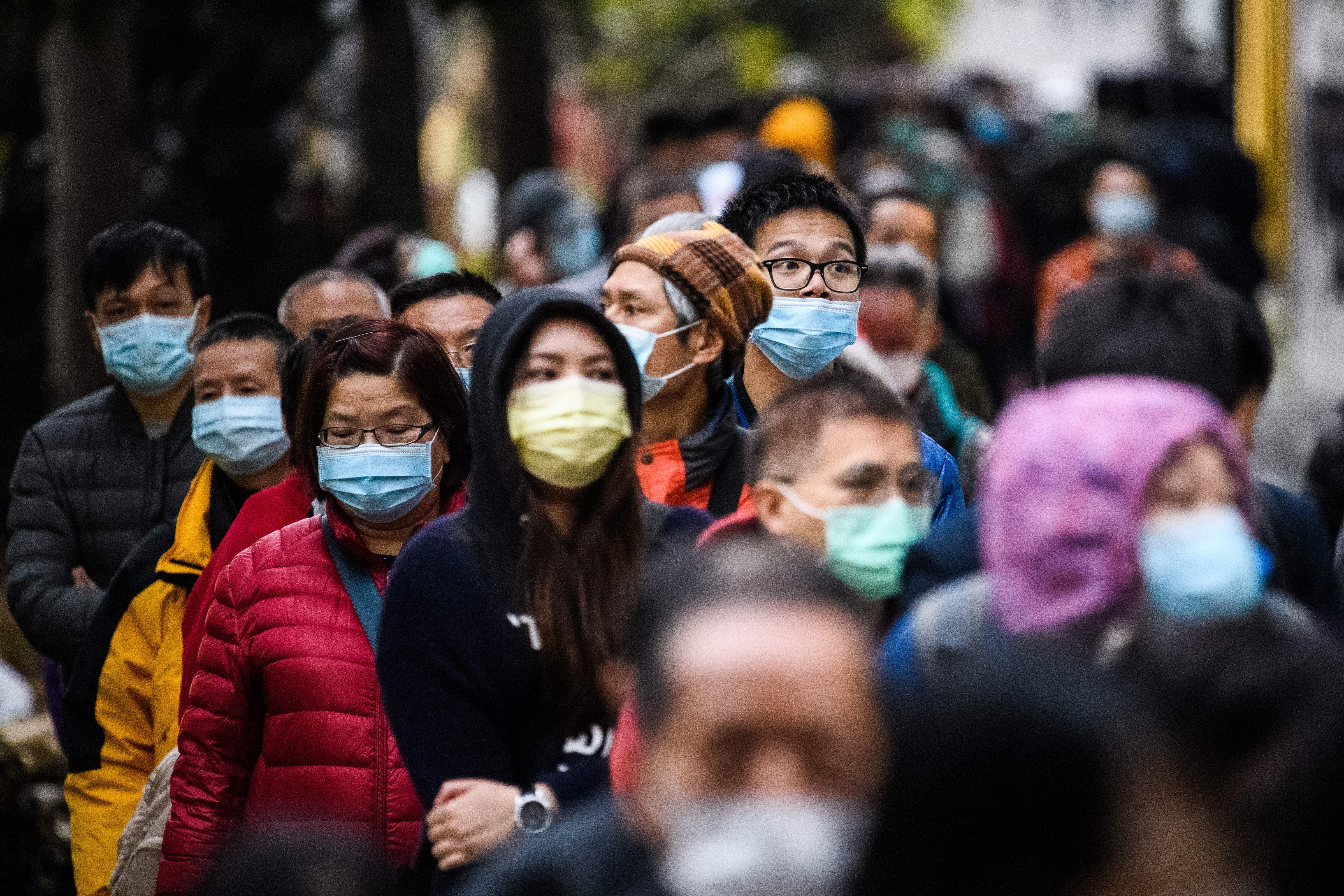 People wearing face masks in Hong Kong on February 5, 2020.