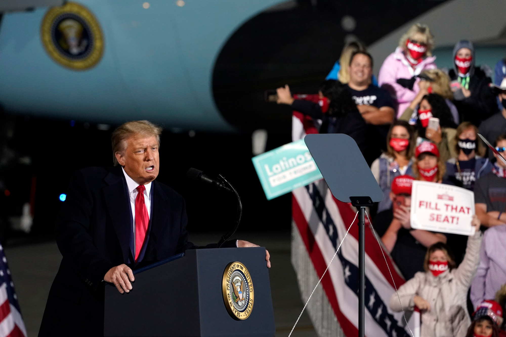 President Donald Trump speaks during a campaign rally at Eugene F. Kranz Toledo Express Airport on September 21 in Swanton, Ohio. 