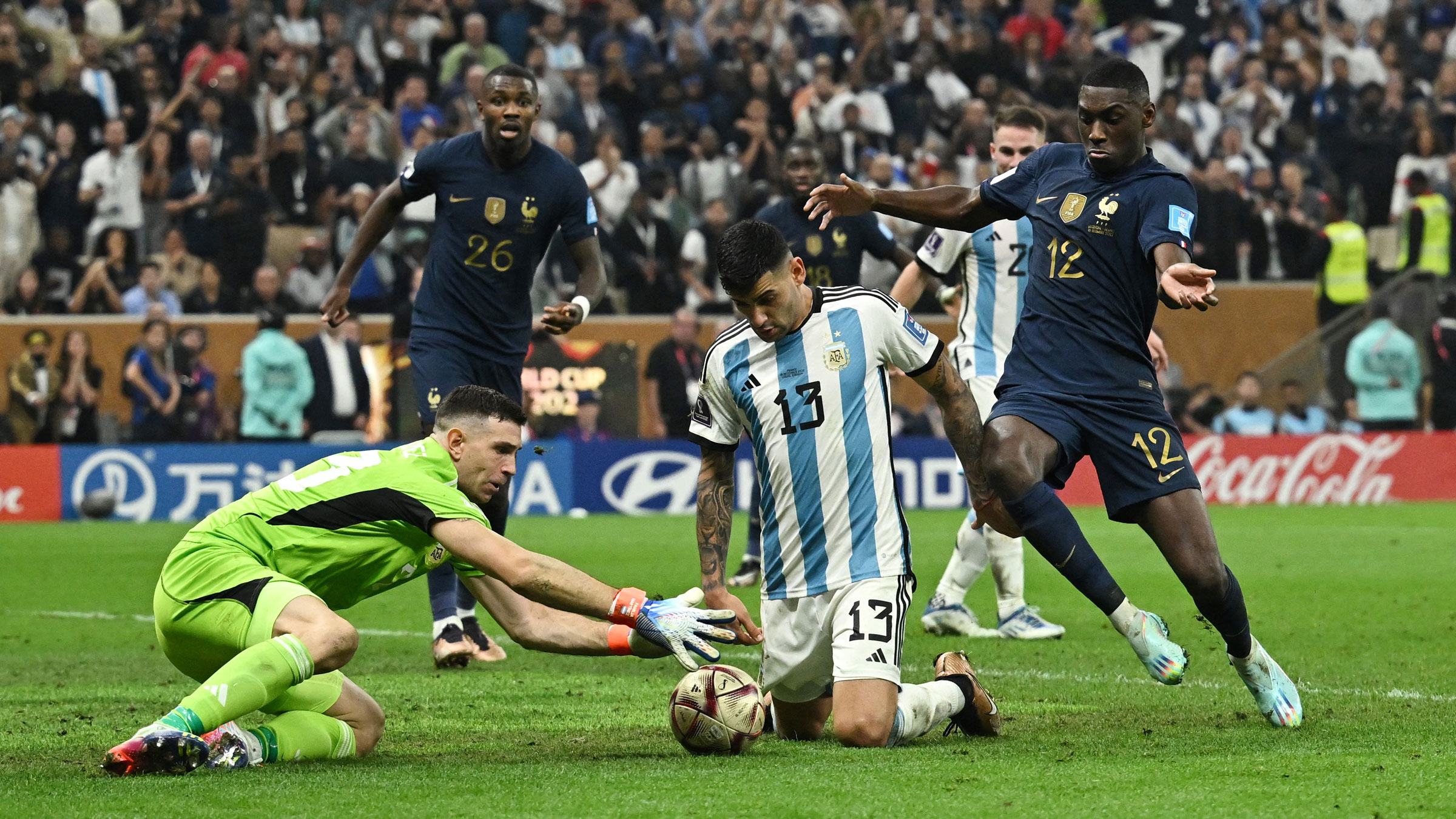 Argentina goalkeeper Emiliano Martinez secures the ball late in the second half.