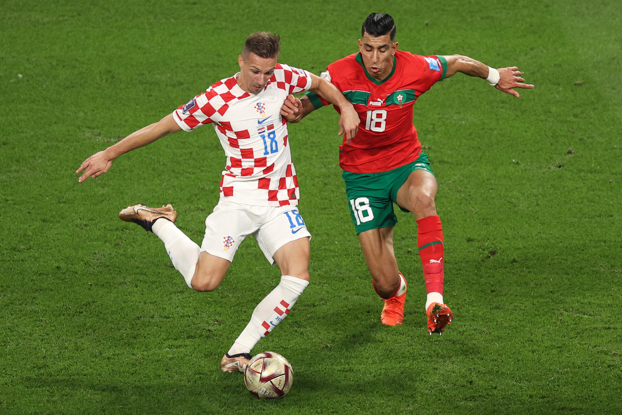 Croatia's Mislav Orsic and Morocco's Jawad El Yamiq fight for the ball on Saturday. 