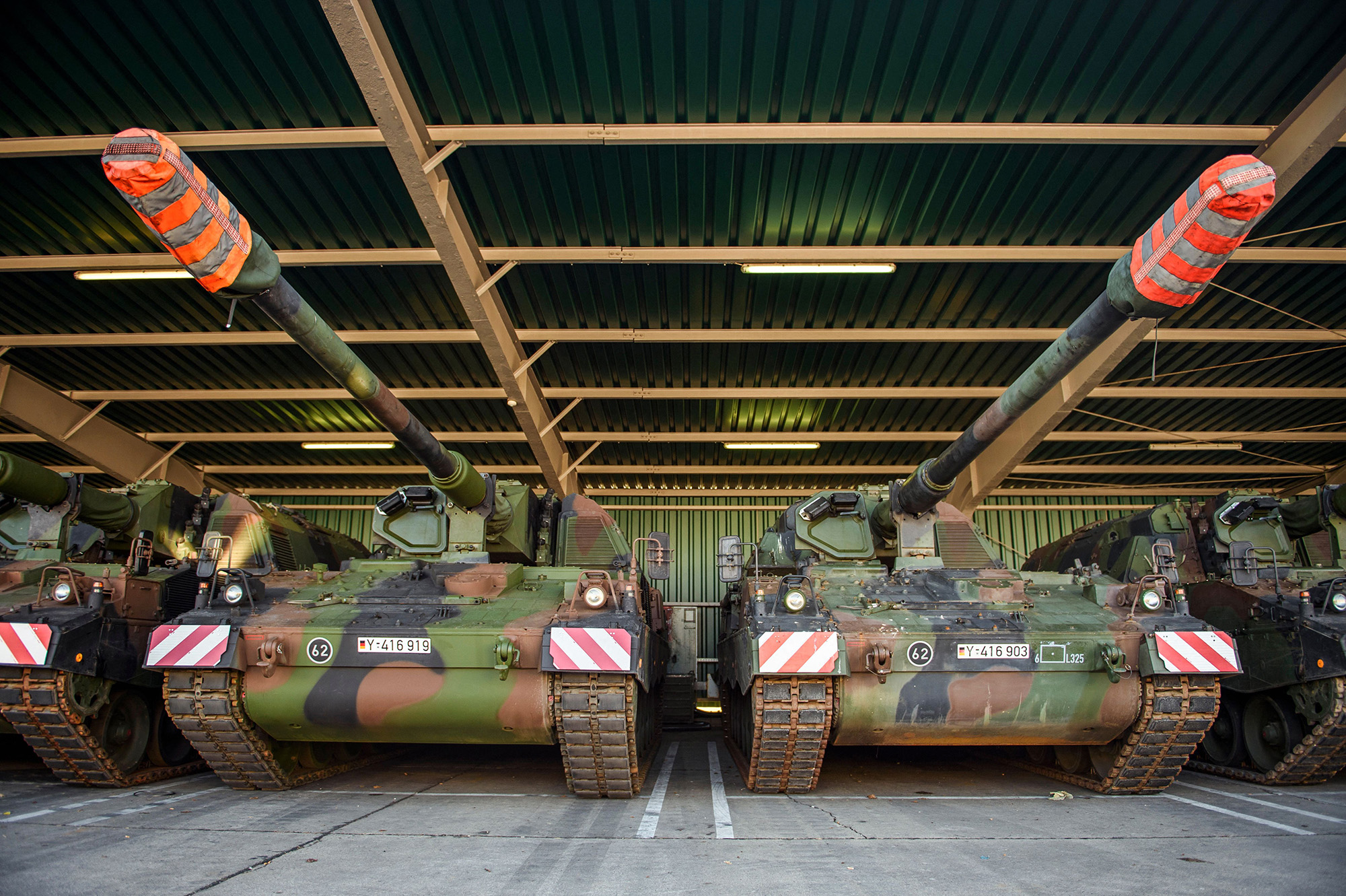 Mounted howitzers, Panzerhaubitze 2000, of the German Bundeswehr stand at the Hindenburg barracks in Munster, Germany, on February 14.