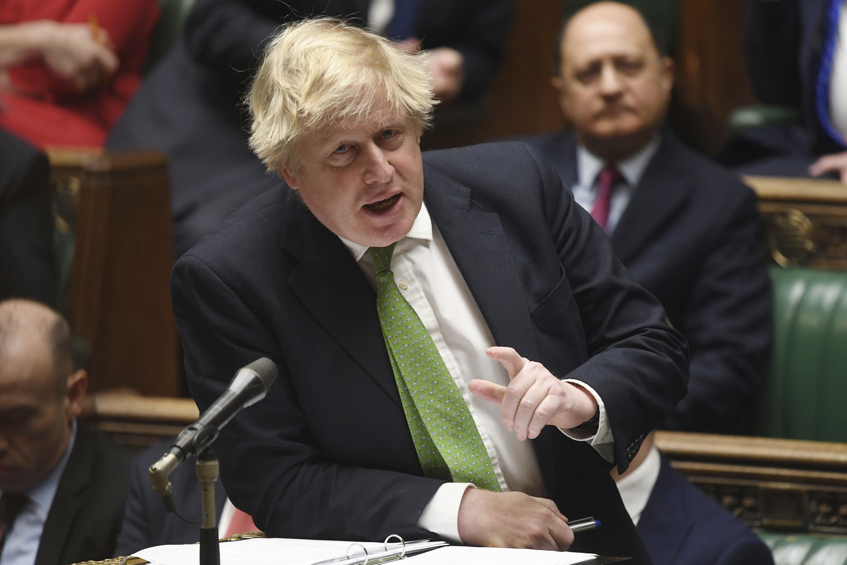 In this handout photo provided by UK Parliament, Britain's Prime Minister Boris Johnson updates MPs on the latest situation in Ukraine, in the House of Commons in London, on February 22 .