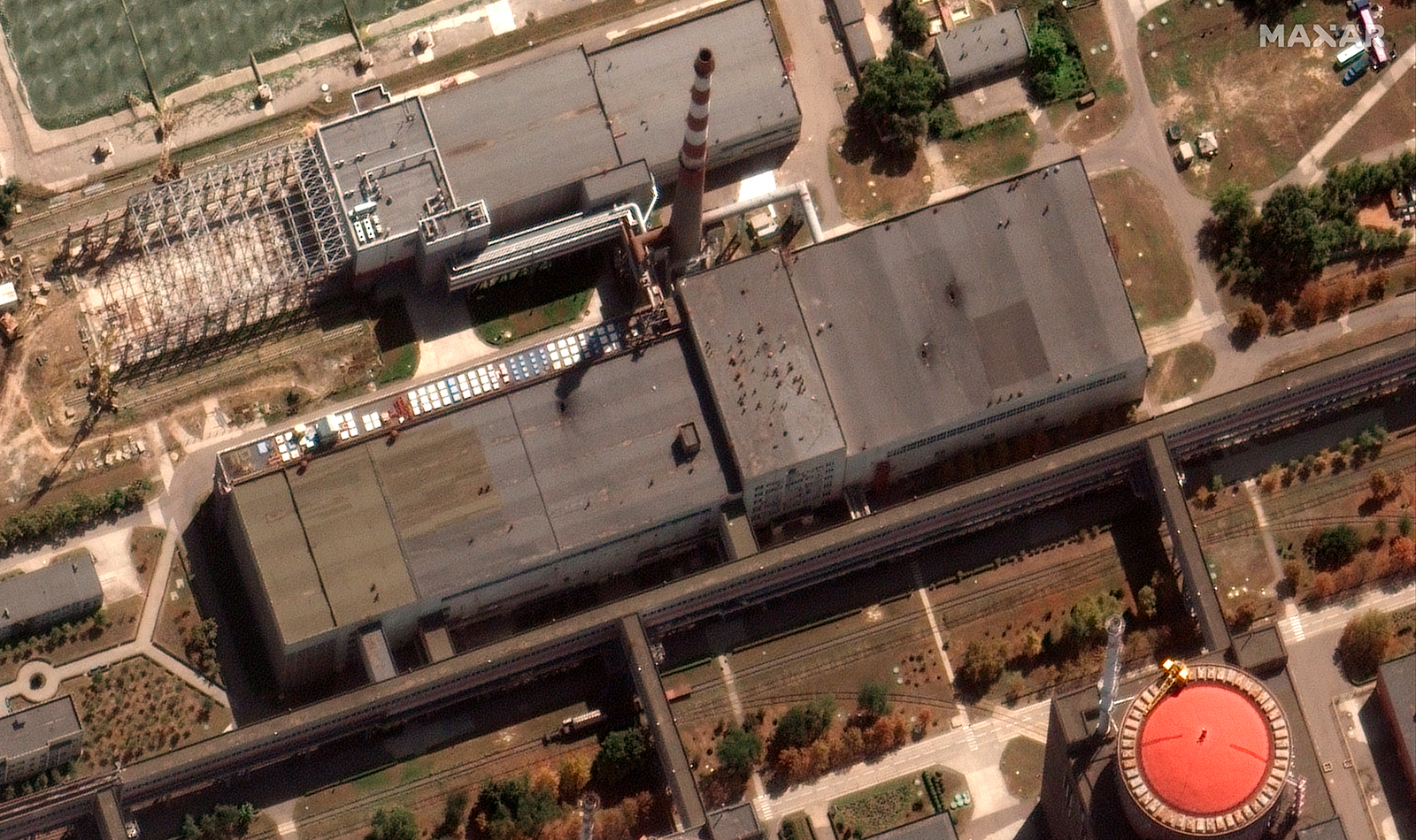 This satellite image shows damage to the roof of a building adjacent to several of the nuclear reactors at the Zaporizhzhia nuclear plant on August, 29.
