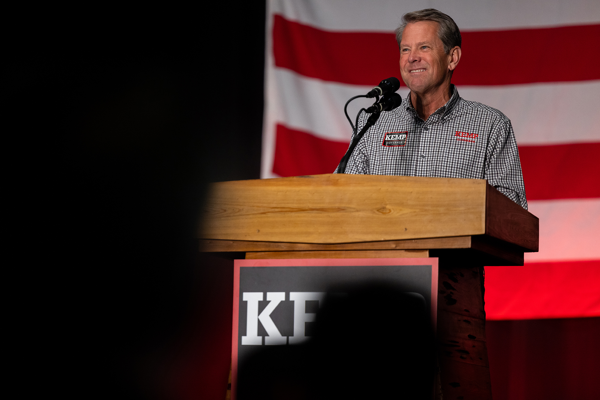 Gov. Brian Kemp speaks at a campaign rally at Cobb County International Airport in Kennesaw, Georgia, on Monday. 