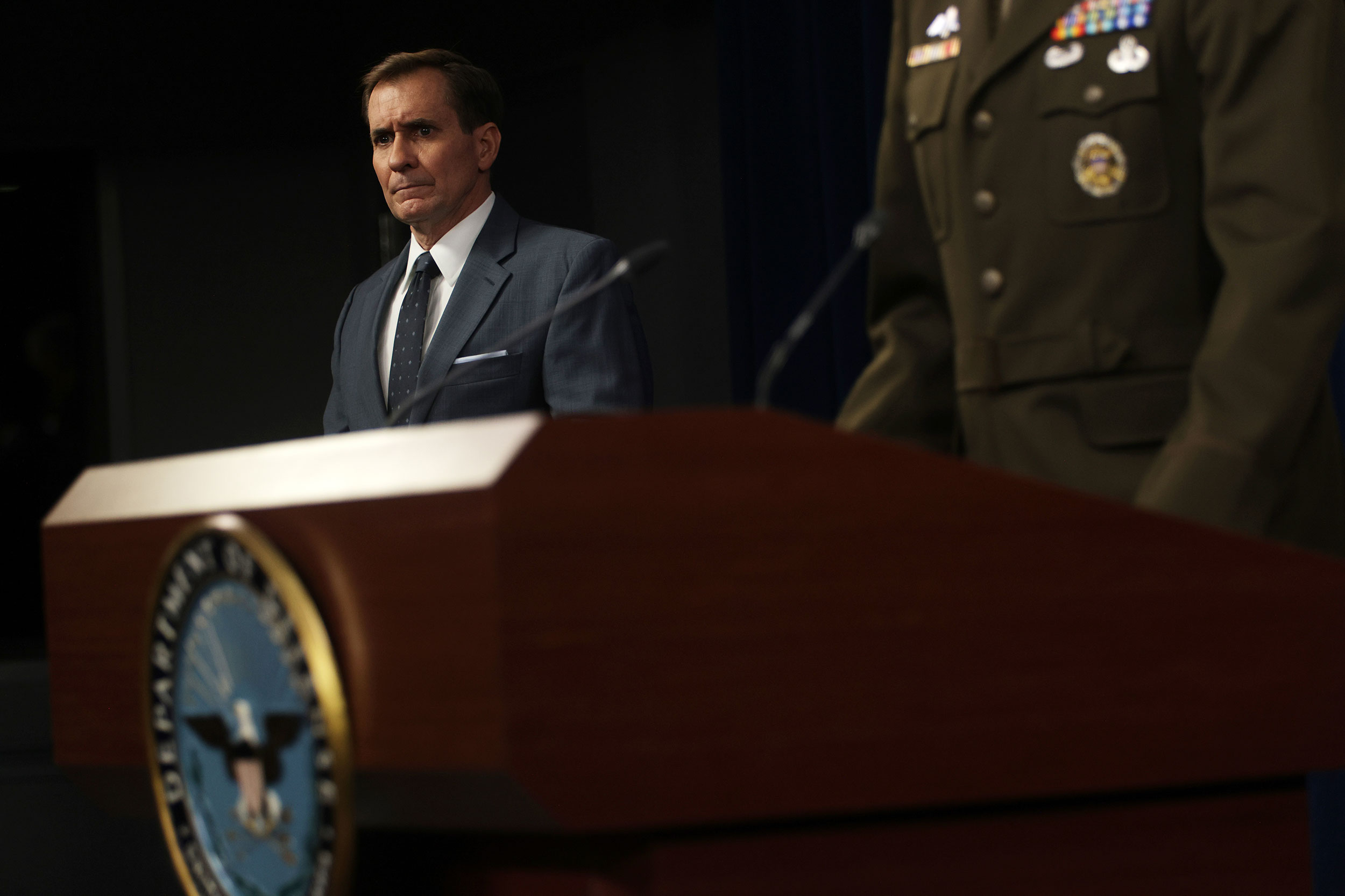 Pentagon spokesperson John Kirby listens during a news briefing at the Pentagon on August 17.