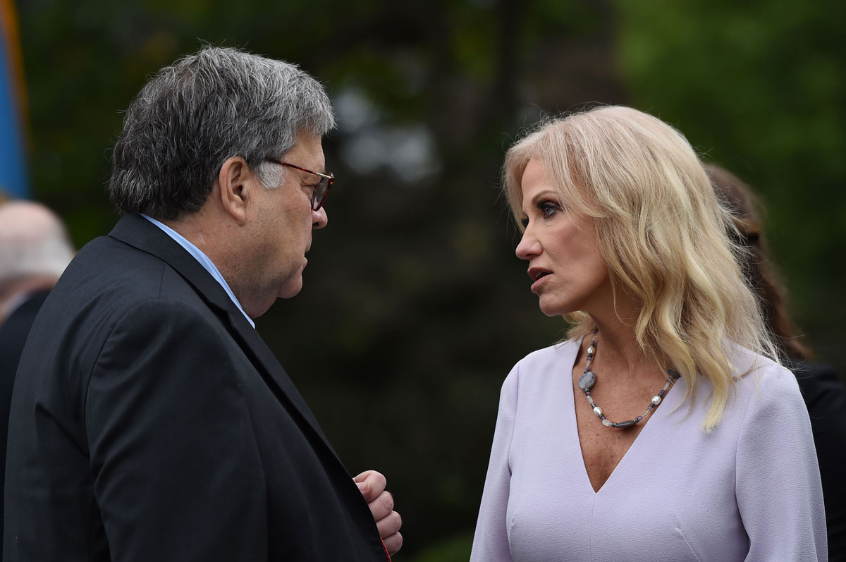 William Barr speaks with Kellyanne Conway at the Rose Garden ceremony where President Donald Trump nominated Judge Amy Coney Barrett to the US Supreme Court on September 26.