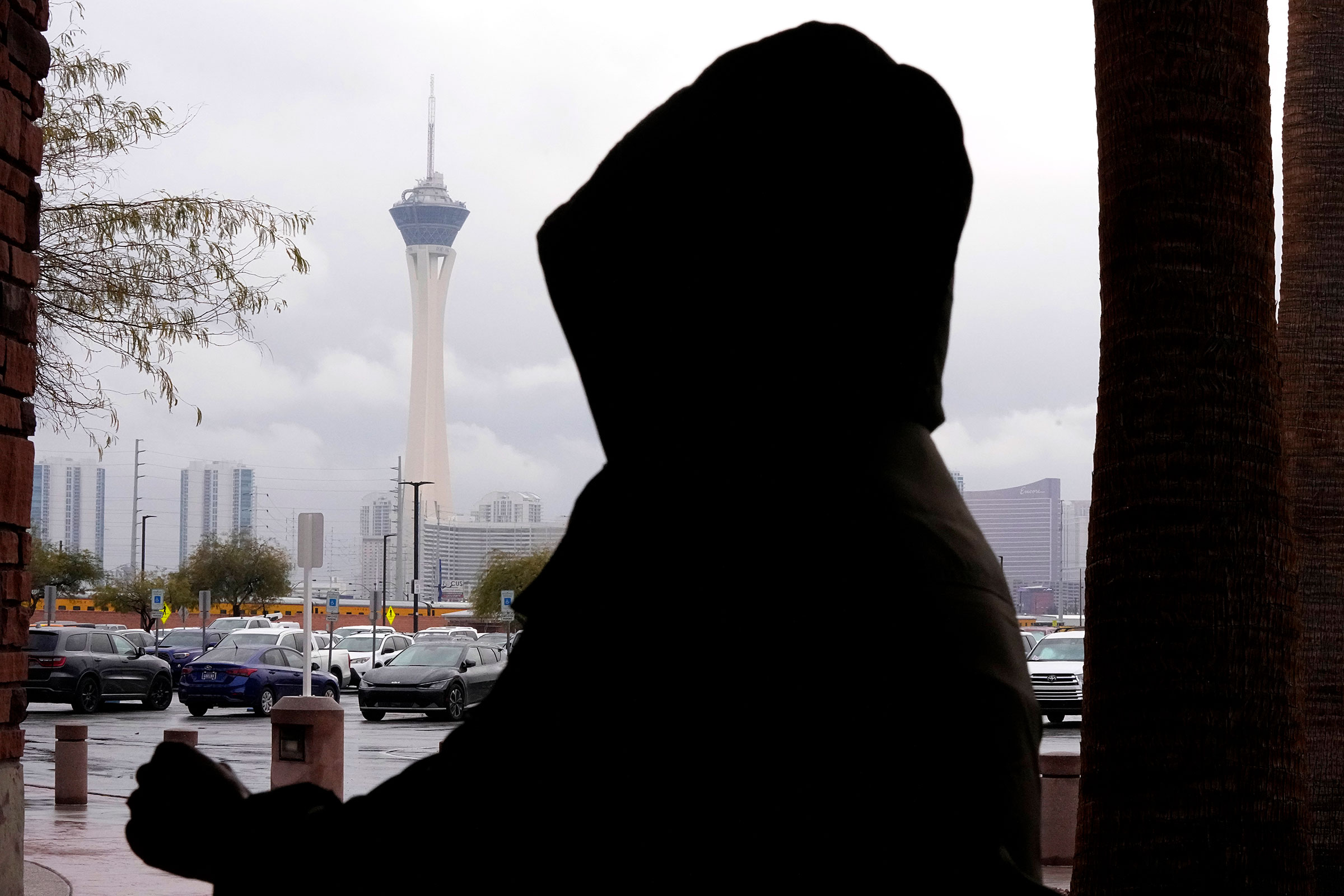 Sandy Brannum walks into the Clark County Government Center as the Las Vegas strip is seen in the background on Tuesday.