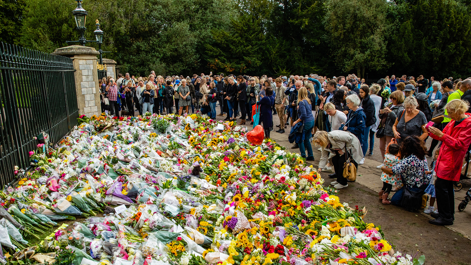 Visitors leave floral tributes outside Windsor Castle on September 9. 