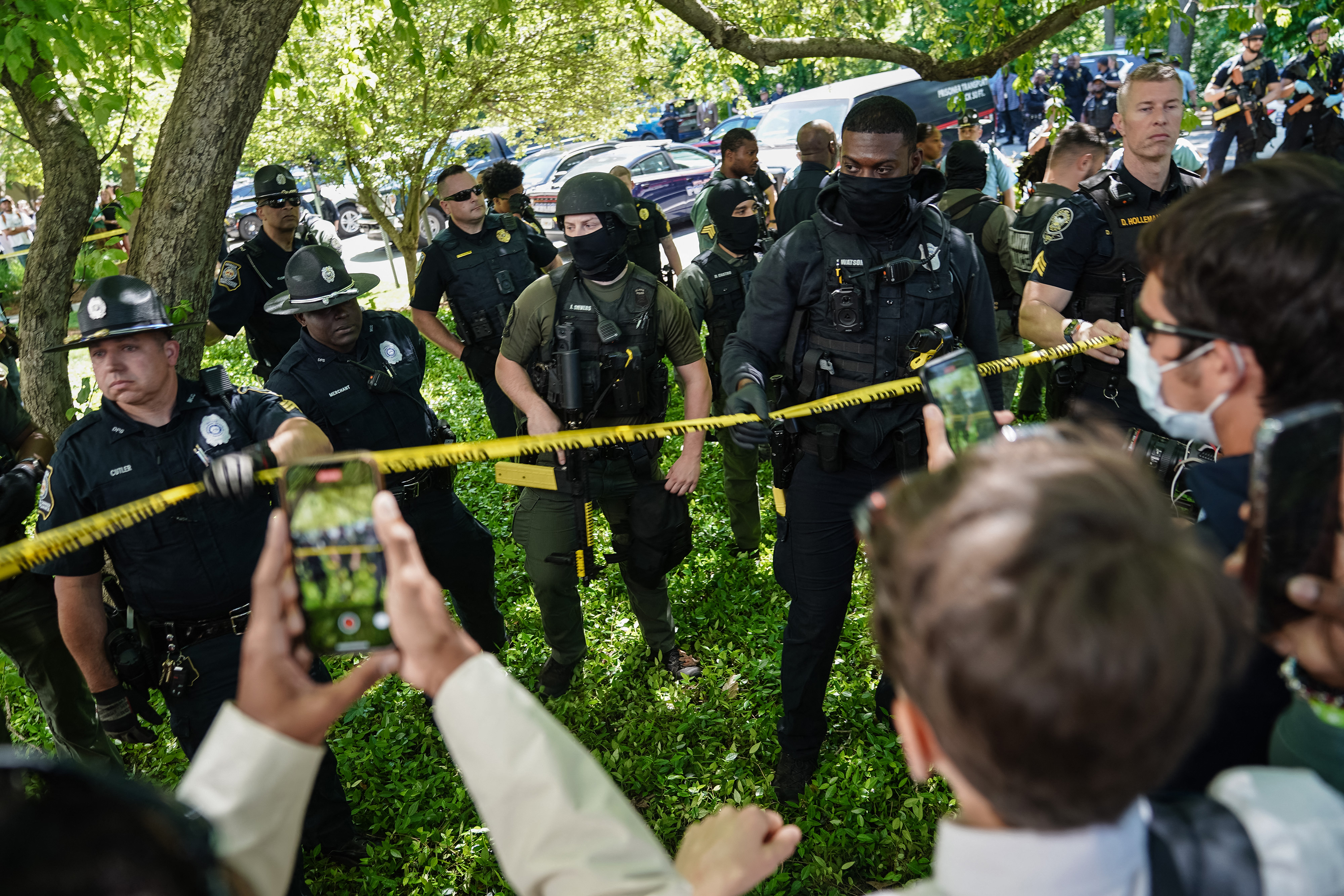 Pro-Palestinian activists confront police officers during a demonstration at Emory University on April 25, in Atlanta, Georgia.