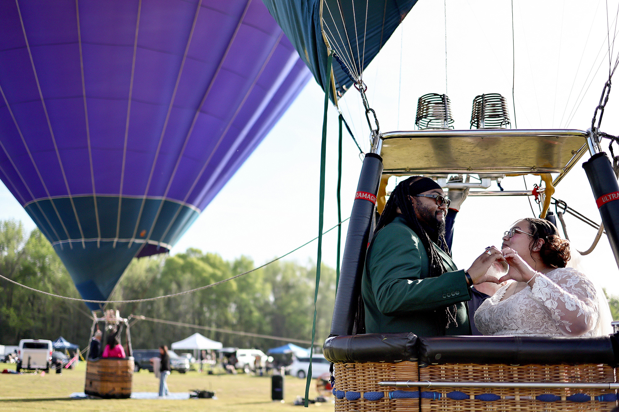 Kylee and Michael Rice prepare to take a hot air balloon ride before a planned mass wedding of over 200 couples in Russellville, Arkansas. 