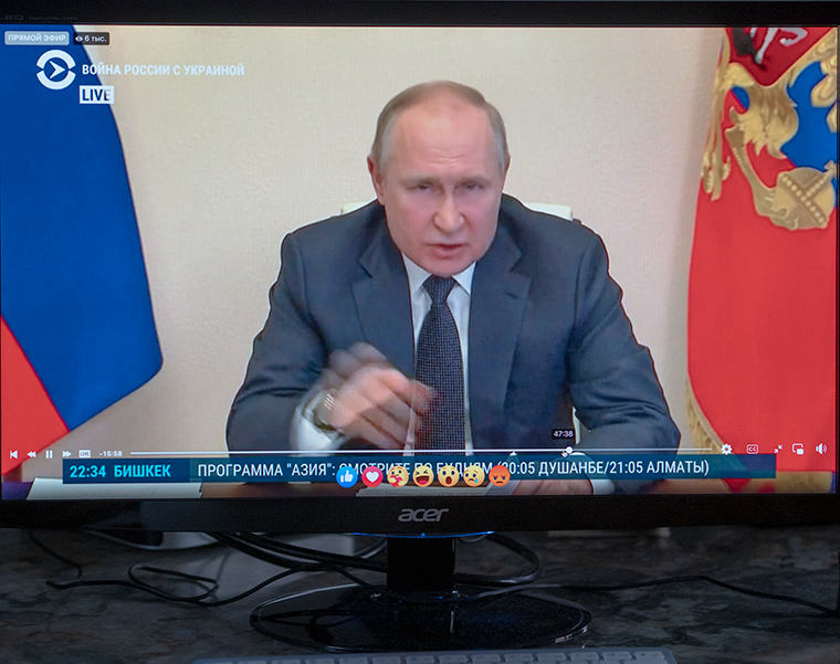 An image on a computer screen of Vladimir Putin holding a meeting on measures to provide social and economic support to the regions. Most of his speeches concerned Ukraine and the "fifth column" inside Russia. 
